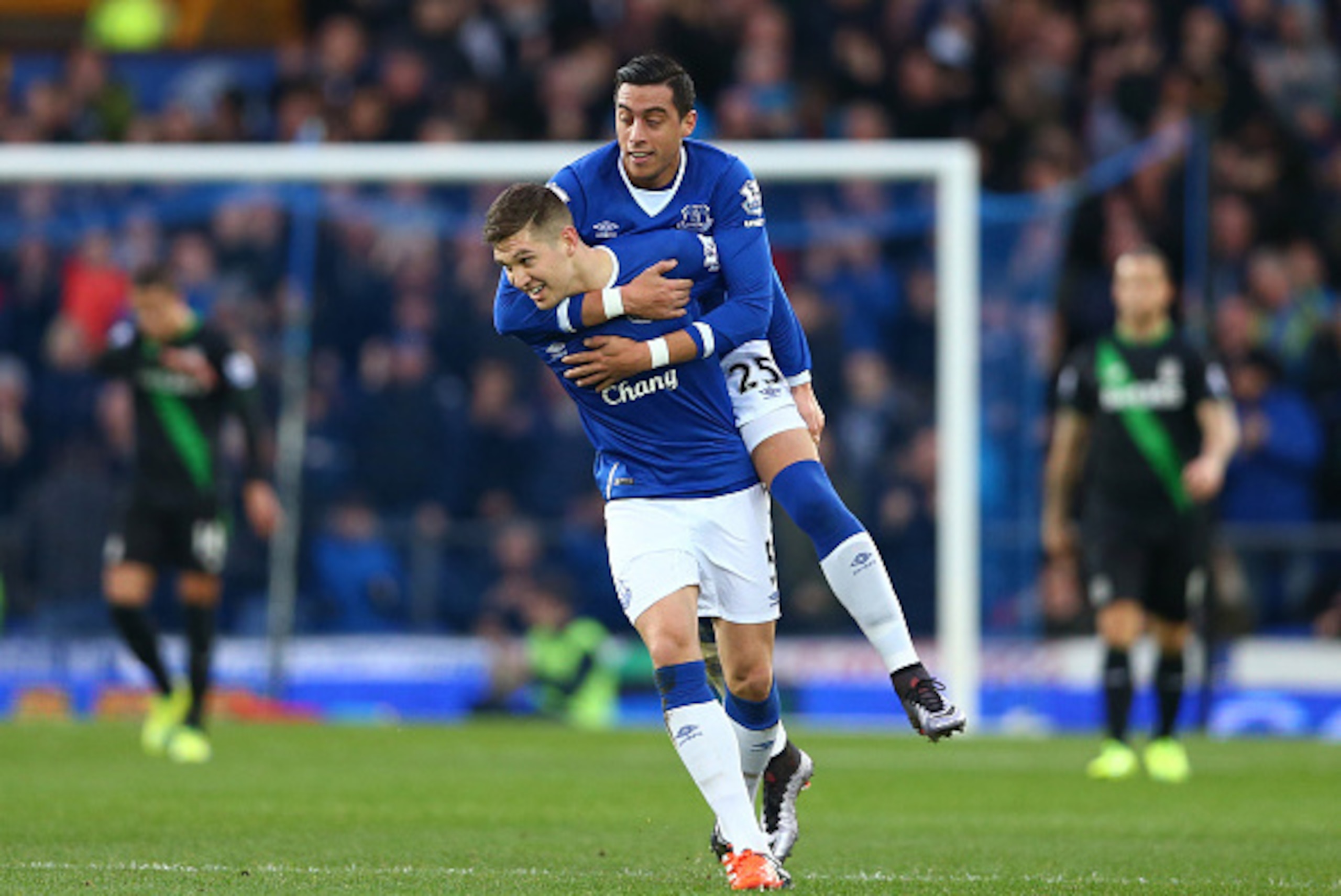 LIVERPOOL, ENGLAND - DECEMBER 28:  John Stones (L) and Ramiro Funes Mori (R) of Everton celebrates their team's first goal during the Barclays Premier League match between Everton and Stoke City at Goodison Park on December 28, 2015 in Liverpool, England.