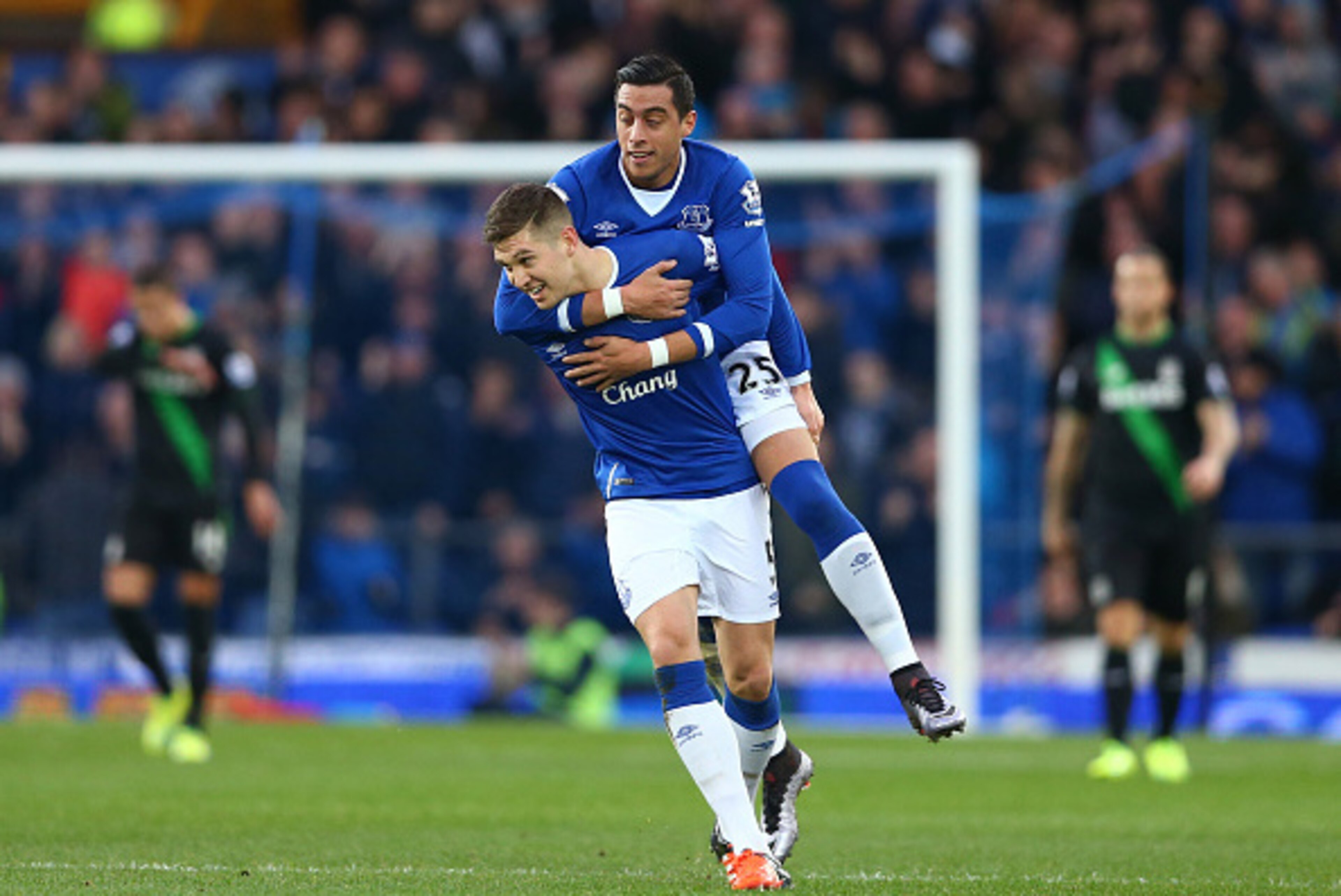 LIVERPOOL, ENGLAND - DECEMBER 28:  John Stones (L) and Ramiro Funes Mori (R) of Everton celebrates their team's first goal during the Barclays Premier League match between Everton and Stoke City at Goodison Park on December 28, 2015 in Liverpool, England.