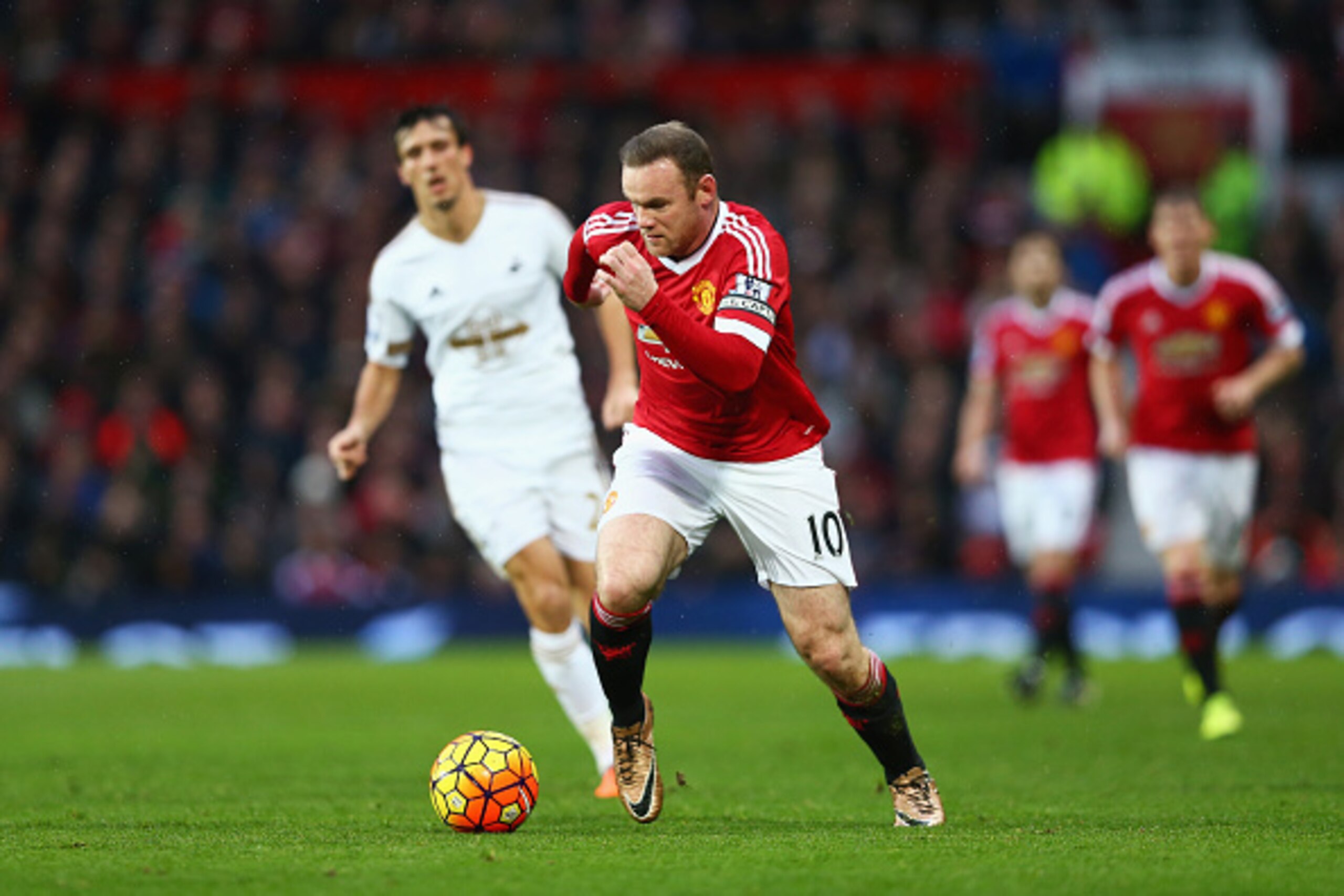MANCHESTER, ENGLAND - JANUARY 02: Wayne Rooney of Manchester United in action during the Barclays Premier League match between Manchester United and Swansea City at Old Trafford on January 2, 2016 in Manchester, England.  (Photo by Clive Brunskill/Getty I