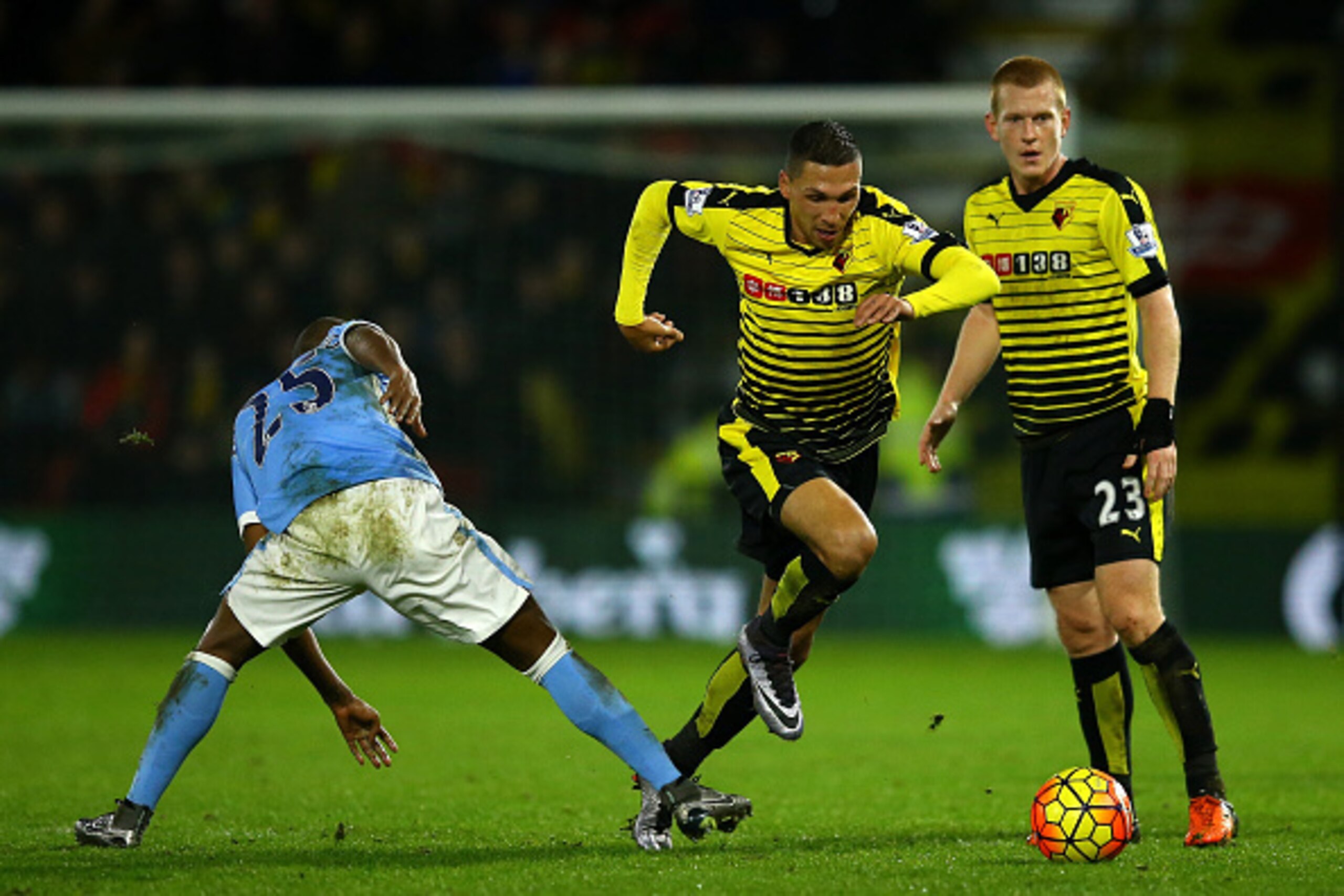 WATFORD, ENGLAND - JANUARY 02: Jose Holebas of Watford skips past the tackle of Fernandinho of Manchester City during the Barclays Premier League match between Watford and Manchester City at Vicarage Road on January 2, 2016 in Watford, England. (Photo b WATFORD, ENGLAND - JANUARY 02: Jose Holebas of Watford skips past the tackle of Fernandinho of Manchester City during the Barclays Premier League match between Watford and Manchester City at Vicarage Road on January 2, 2016 in Watford, England. (Photo b