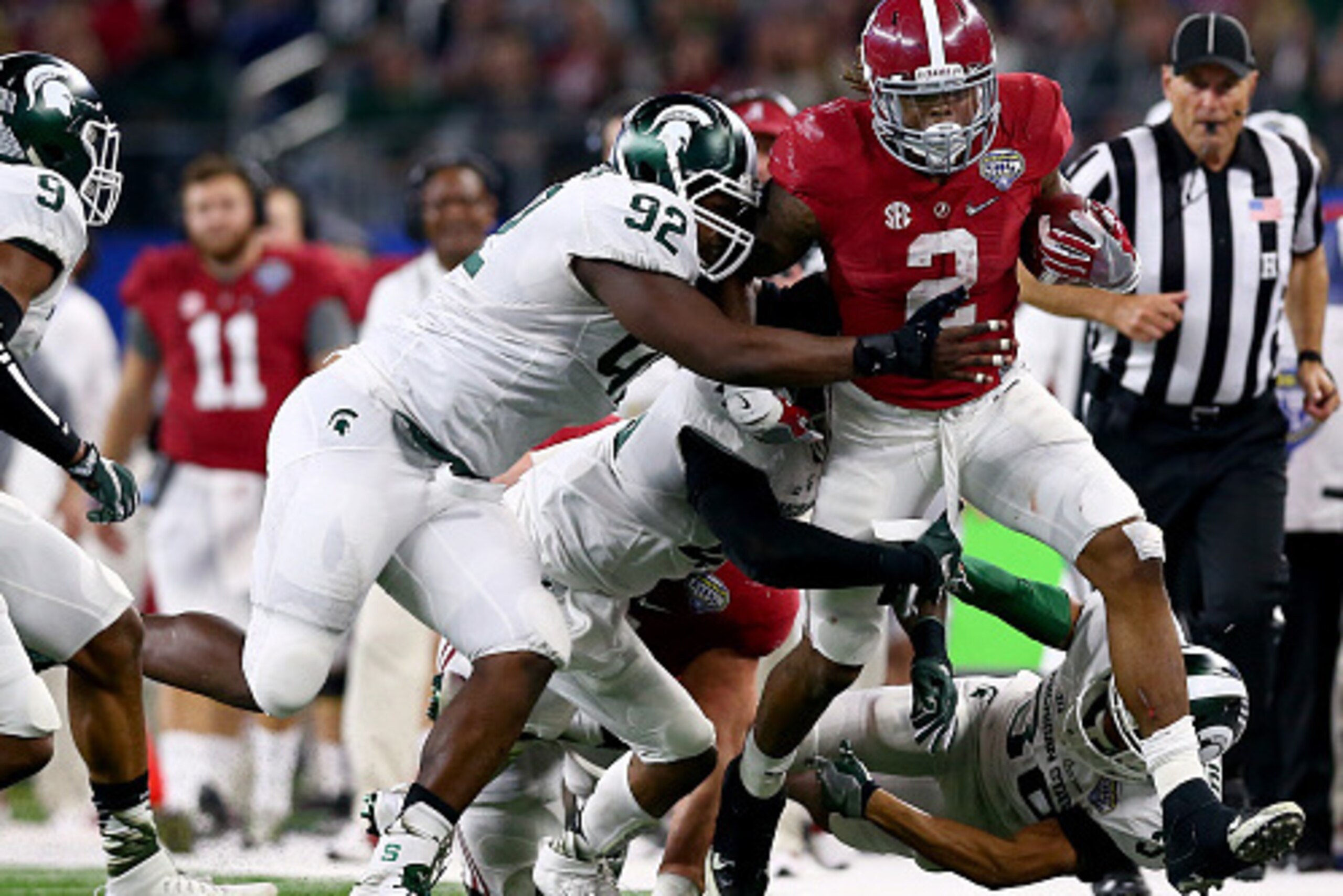 ARLINGTON, TX - DECEMBER 31:  Running back Derrick Henry #2 of the Alabama Crimson Tide runs the ball in the third quarter against the Michigan State Spartans during the Goodyear Cotton Bowl at AT&T Stadium on December 31, 2015 in Arlington, Texas.  (Phot