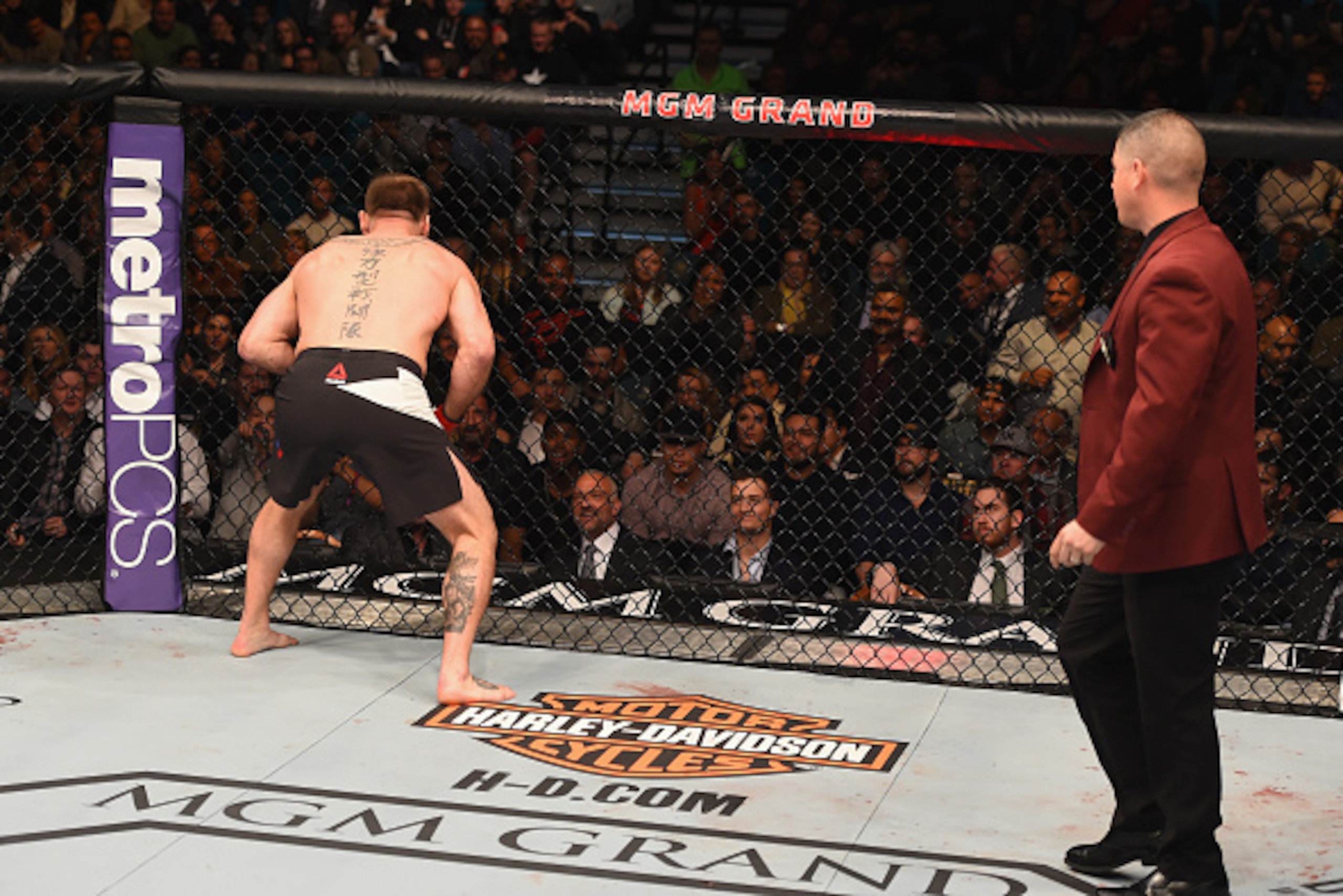 LAS VEGAS, NV - JANUARY 02: Stipe Miocic (left) reacts to his victory over Andrei Arlovski in their heavyweight bout during the UFC 195 event inside MGM Grand Garden Arena on January 2, 2016 in Las Vegas, Nevada.  (Photo by Josh Hedges/Zuffa LLC/Zuffa LLC