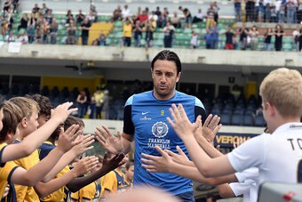VERONA, ITALY - MAY 30: Luca Toni # 9 of Hellas Verona FC gets the pitch prior the beginning of the Serie A match between Hellas Verona FC and Juventus FC at Stadio Marc'Antonio Bentegodi on May 30, 2015 in Verona, Italy.  (Photo by Mario Carlini / Iguana