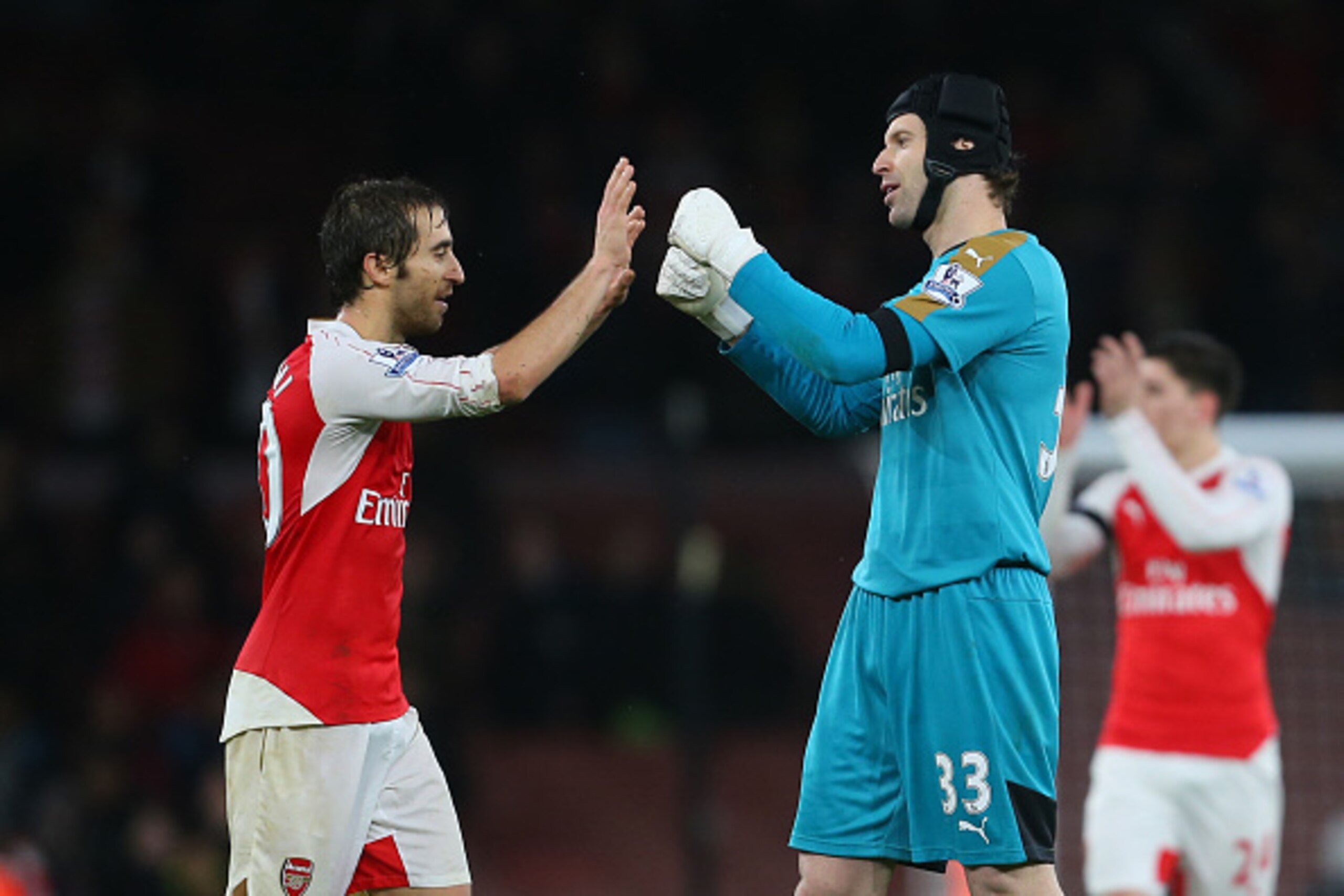 LONDON, ENGLAND - JANUARY 02: Petr Cech of Arsenal celebrates with Mathieu Flamini of Arsenal after the Barclays Premier League match between Arsenal and Newcastle United at Emirates Stadium on January 2, 2016 in London, England. (Photo by Catherine Ivi LONDON, ENGLAND - JANUARY 02: Petr Cech of Arsenal celebrates with Mathieu Flamini of Arsenal after the Barclays Premier League match between Arsenal and Newcastle United at Emirates Stadium on January 2, 2016 in London, England. (Photo by Catherine Ivi