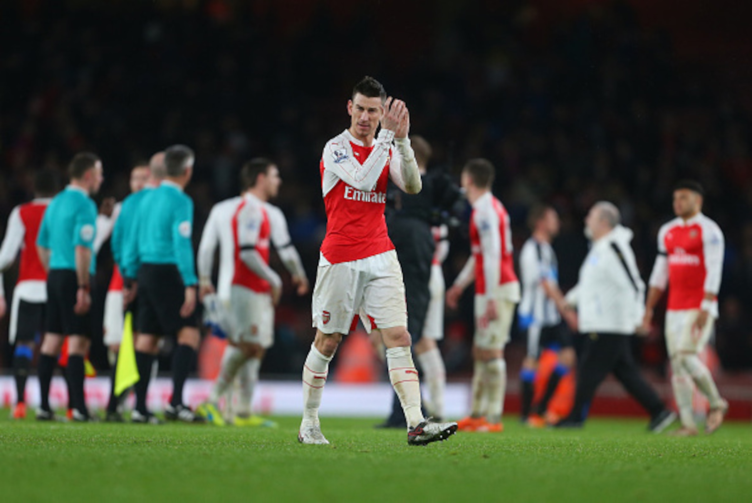 LONDON, ENGLAND - JANUARY 02:  Laurent Koscielny of Arsenal applauds after the Barclays Premier League match between Arsenal and Newcastle United at Emirates Stadium on January 2, 2016 in London, England.  (Photo by Catherine Ivill - AMA/Getty Images)