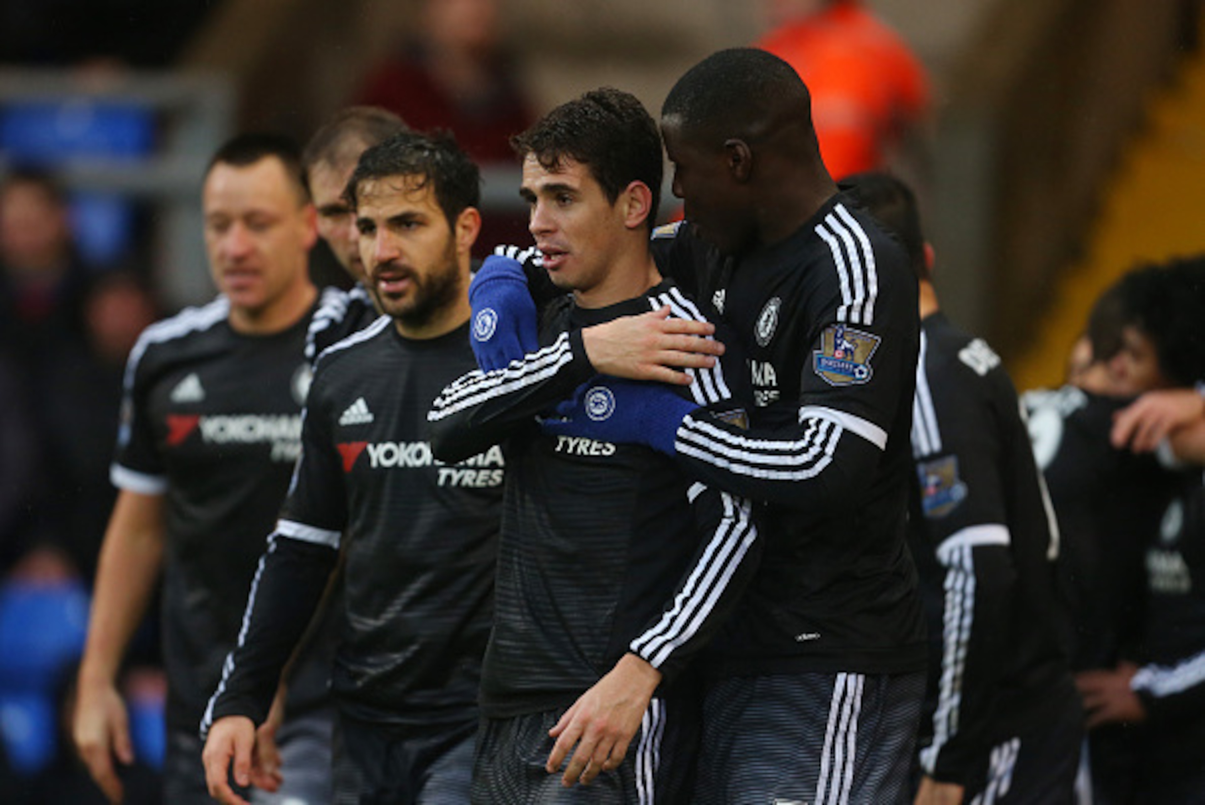 LONDON, ENGLAND - JANUARY 03:  Kurt Zouma of Chelsea hugs Oscar of Chelsea during the Barclays Premier League match between Crystal Palace and Chelsea at Selhurst Park on January 3, 2016 in London, England.  (Photo by Catherine Ivill - AMA/Getty Images)
