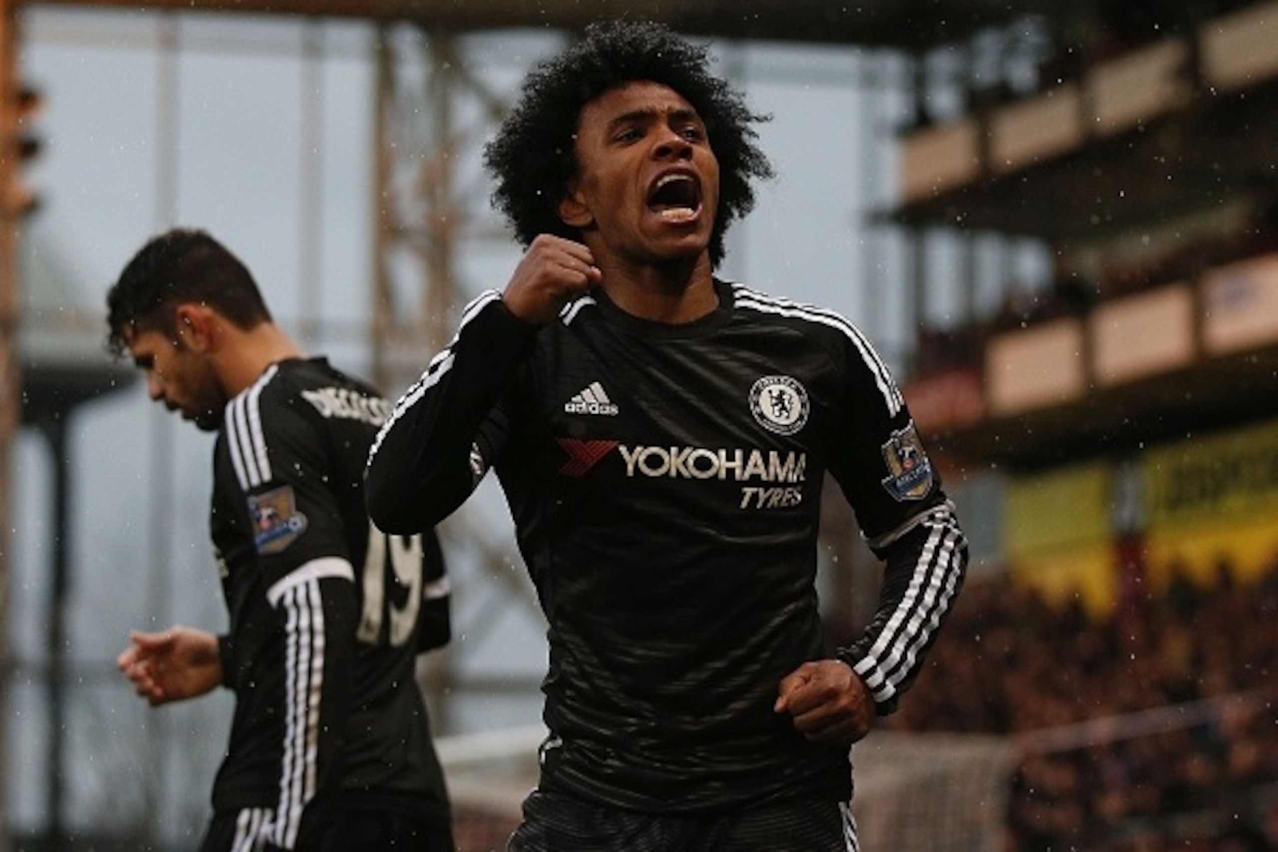 Chelsea's Brazilian midfielder Willian celebrates scoring his team's second goal during the English Premier League football match between Crystal Palace and Chelsea at Selhurst Park in south London on January 3, 2016. AFP PHOTO / ADRIAN DENNIS

RESTRICTED