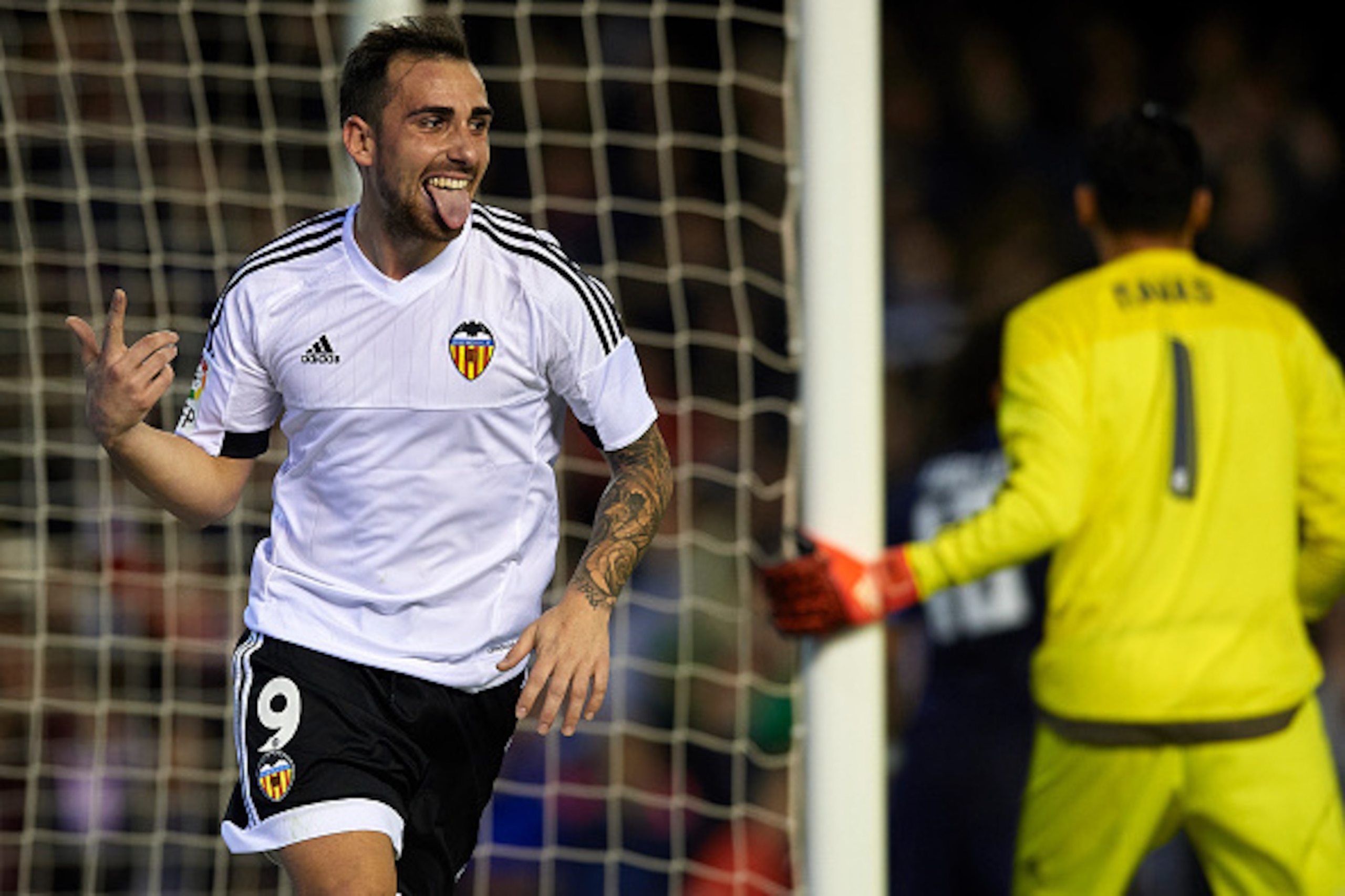 VALENCIA, SPAIN - JANUARY 03: Paco Alcacer of Valencia celebrates scoring his team's second goal during the La Liga match between Valencia CF and Real Madrid CF at Estadi de Mestalla on January 03, 2016 in Valencia, Spain. (Photo by Manuel Queimadelos A VALENCIA, SPAIN - JANUARY 03: Paco Alcacer of Valencia celebrates scoring his team's second goal during the La Liga match between Valencia CF and Real Madrid CF at Estadi de Mestalla on January 03, 2016 in Valencia, Spain. (Photo by Manuel Queimadelos A