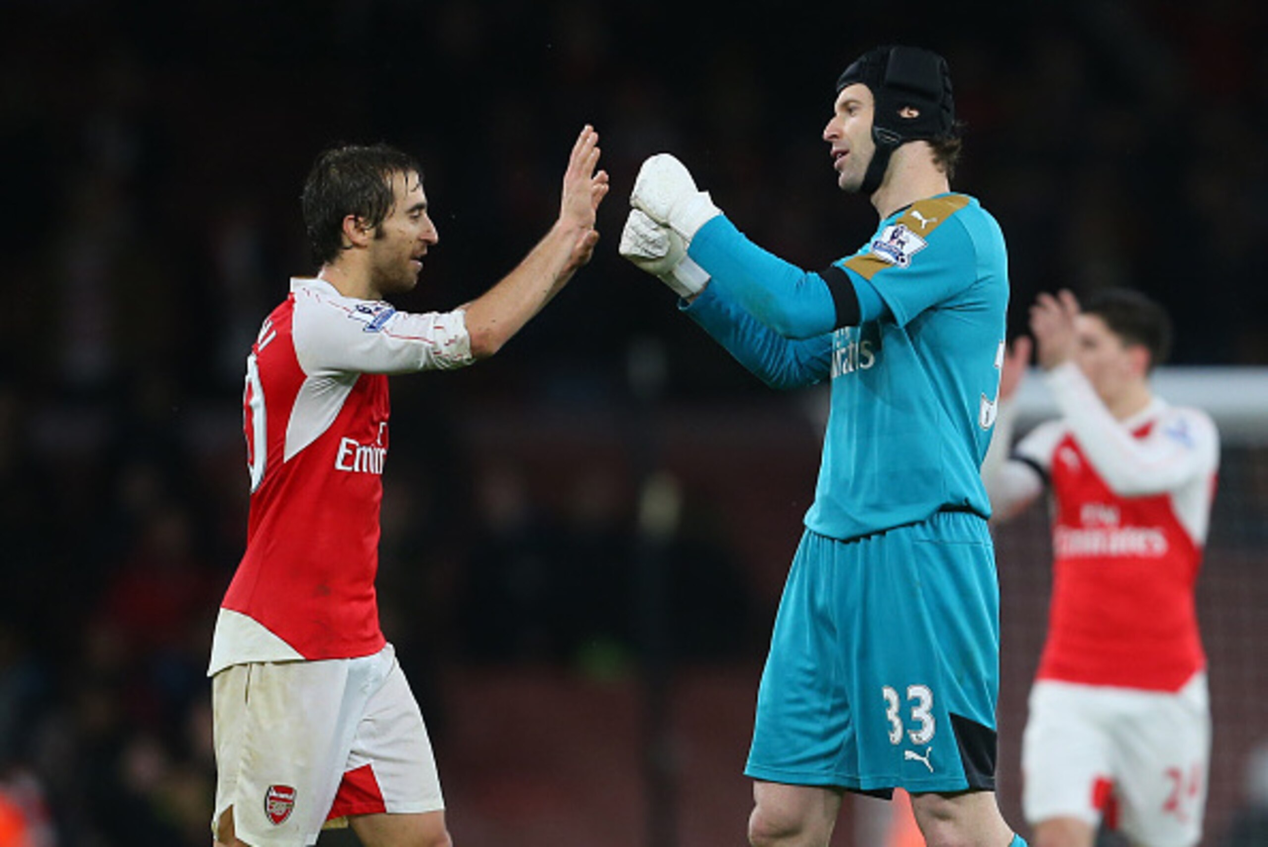 LONDON, ENGLAND - JANUARY 02:  Petr Cech of Arsenal celebrates with Mathieu Flamini of Arsenal after the Barclays Premier League match between Arsenal and Newcastle United at Emirates Stadium on January 2, 2016 in London, England.  (Photo by Catherine Ivi