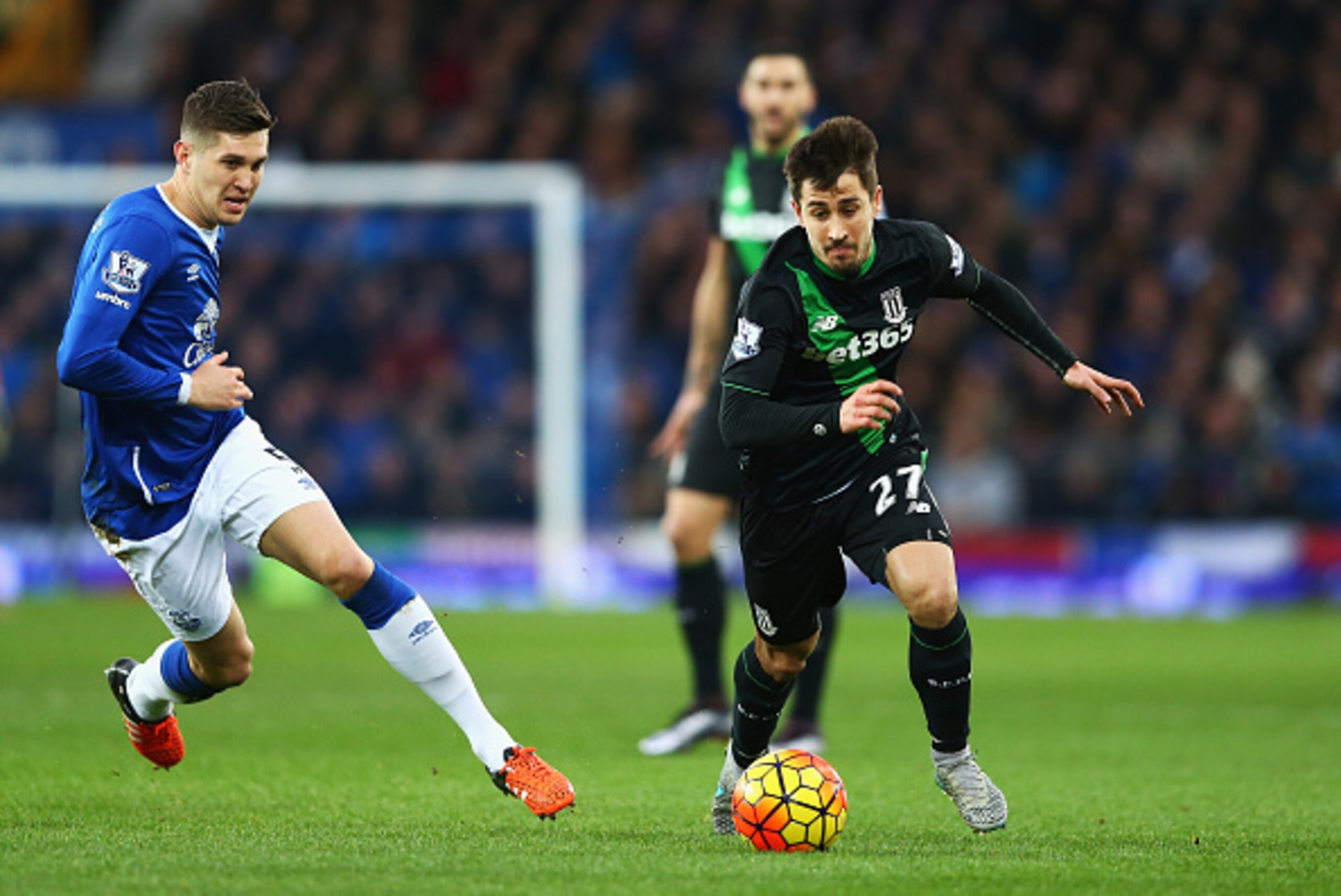 LIVERPOOL, ENGLAND - DECEMBER 28: Bojan Krkic of Stoke City and John Stones of Everton compete for the ball during the Barclays Premier League match between Everton and Stoke City at Goodison Park on December 28, 2015 in Liverpool, England.  (Photo by Cli