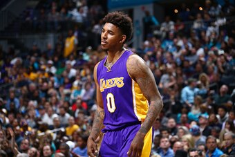 CHARLOTTE, NC - DECEMBER 28: Nick Young #0 of the Los Angeles Lakers looks on during the game against the Charlotte Hornets on December 28, 2015 at Time Warner Cable Arena in Charlotte, North Carolina. NOTE TO USER: User expressly acknowledges and agrees 