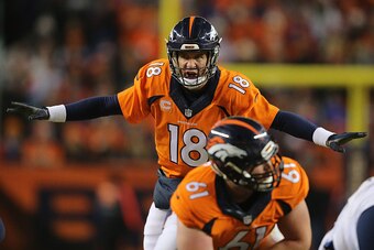 DENVER, CO - JANUARY 03:  Quarterback Peyton Manning #18 of the Denver Broncos runs the offense against the San Diego Chargers at Sports Authority Field at Mile High on January 3, 2016 in Denver, Colorado. The Broncos defeated the Chargers 27-20.  (Photo 