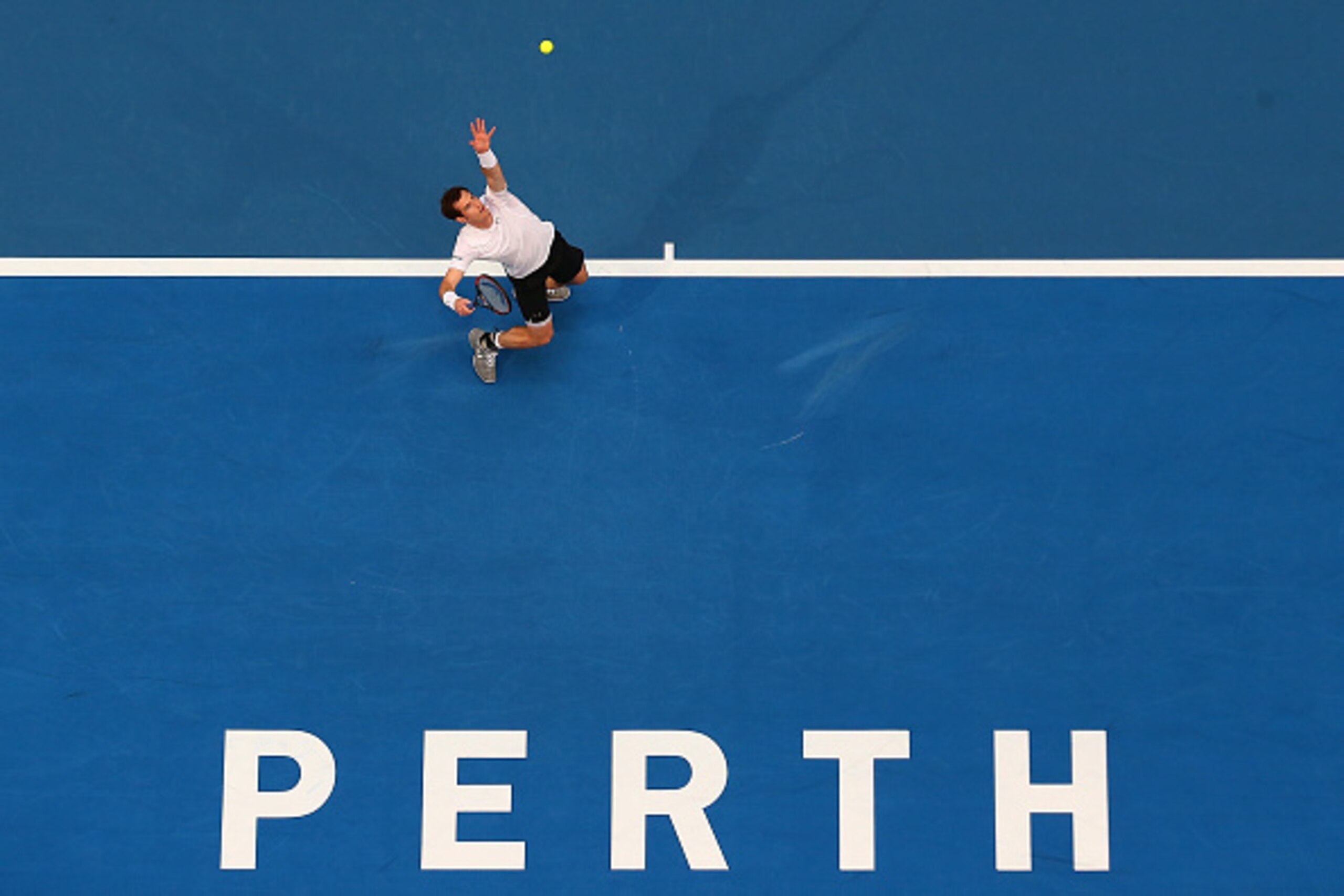 PERTH, AUSTRALIA - JANUARY 04:  Andy Murray of Great Britain serves in his singles match against Kenny De Schepper of France during day two of the 2016 Hopman Cup at Perth Arena on January 4, 2016 in Perth, Australia.  (Photo by Paul Kane/Getty Images)