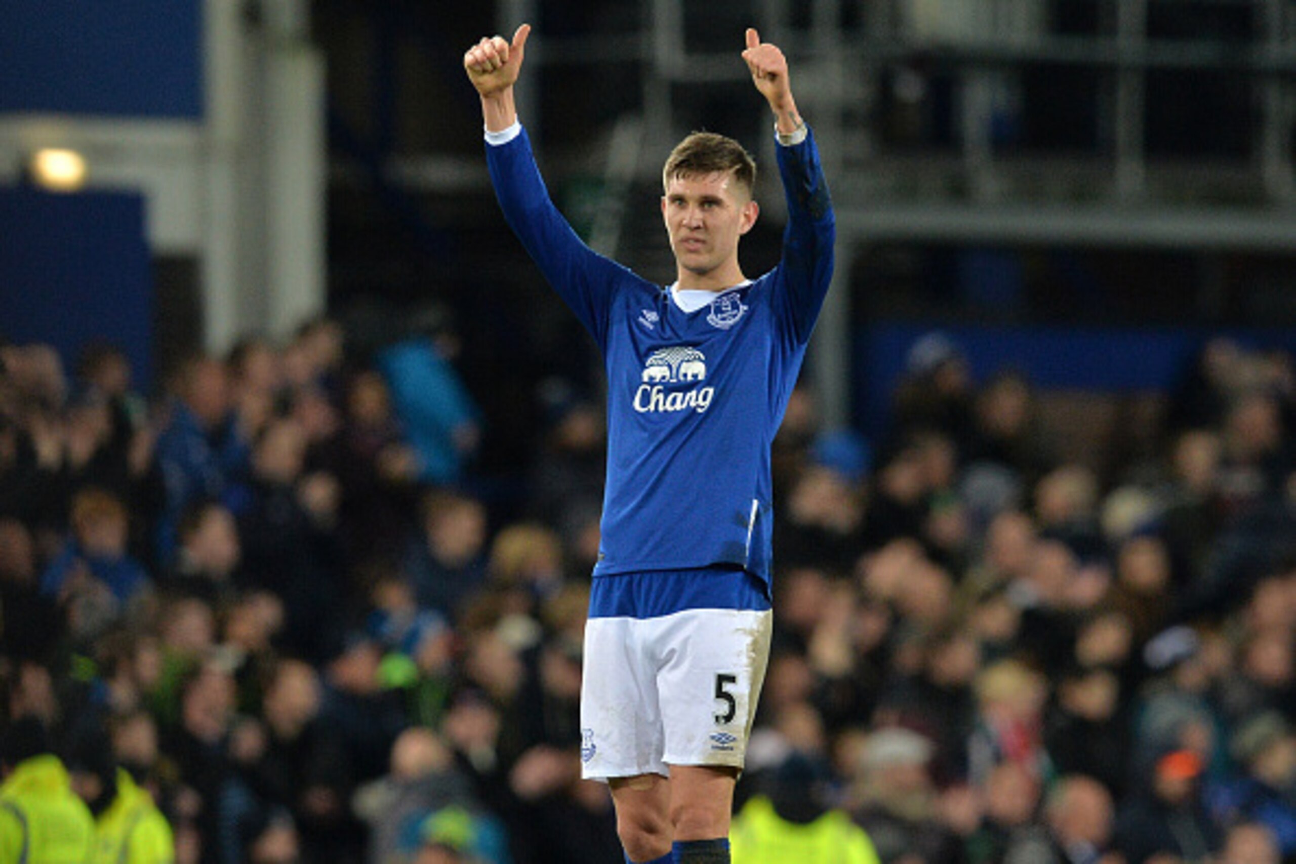 Everton's English defender John Stones gestures to supporters after the English Premier League football match between Everton and Tottenham Hotspur at Goodison Park in Liverpool, north west England on January 3, 2016. The game finished 1-1.  AFP PHOTO / P
