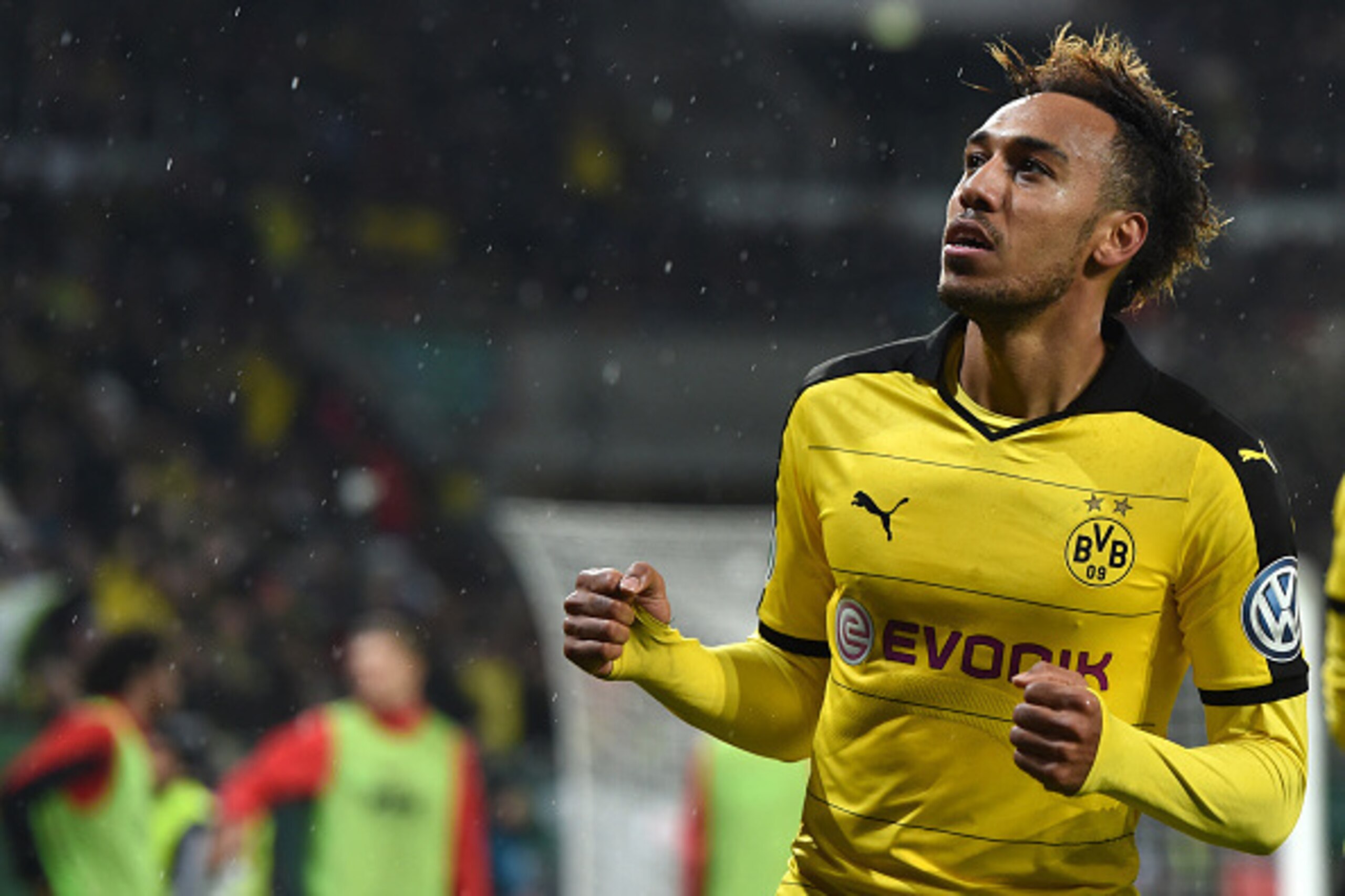 Dortmund's Gabonese striker Pierre-Emerick Aubameyang celebrates after his goal during the German Cup DFB Pokal third round match between Borussia Dortmund and FC Augsburg in Augsburg on December 16, 2015.  / AFP / Christof STACHE / RESTRICTIONS: ACCORDIN