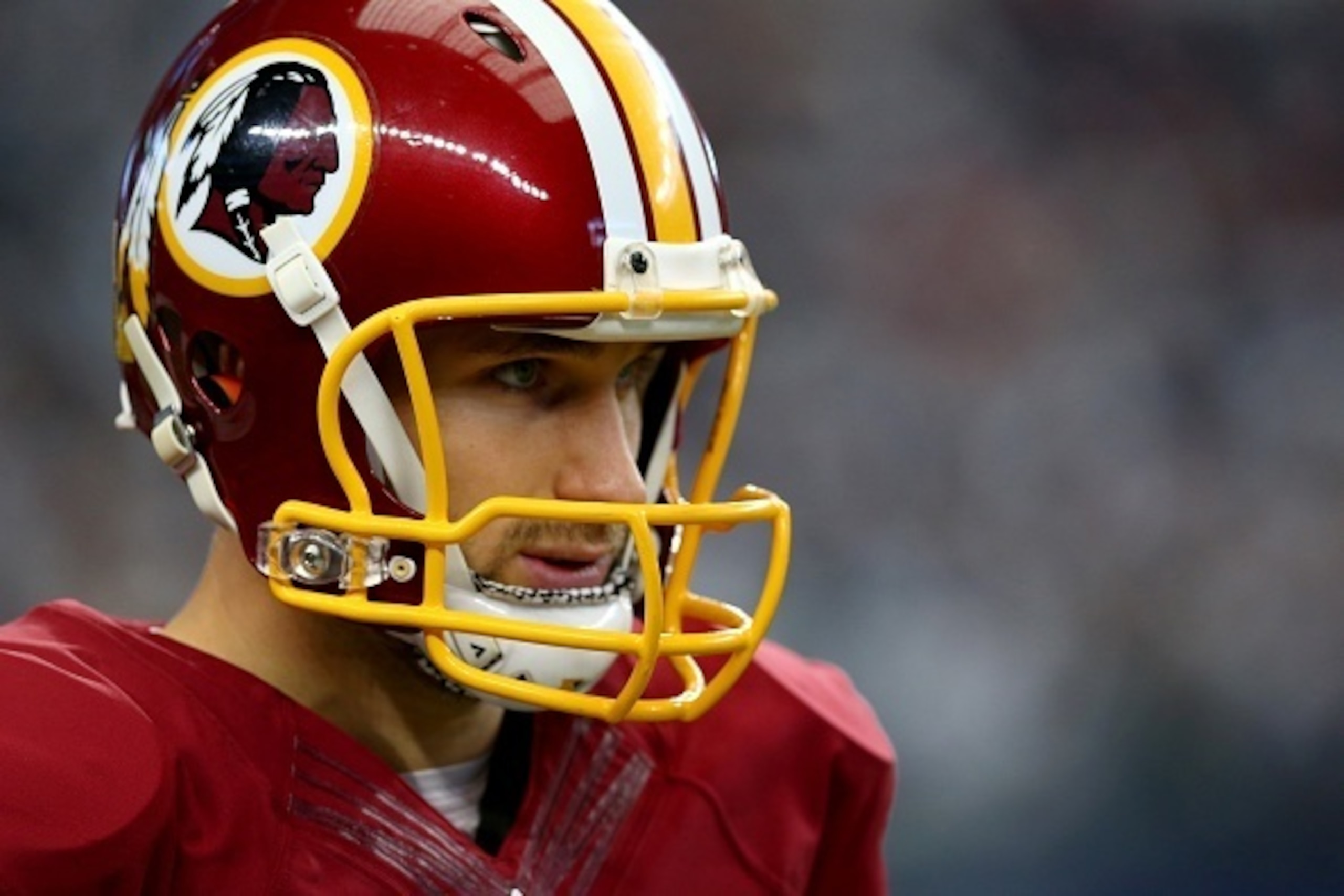 ARLINGTON, TX - JANUARY 03: Kirk Cousins #8 of the Washington Redskins looks on before the Redskins take on the Dallas Cowboys at AT&T Stadium on January 3, 2016 in Arlington, Texas. (Photo by Ronald Martinez/Getty Images)