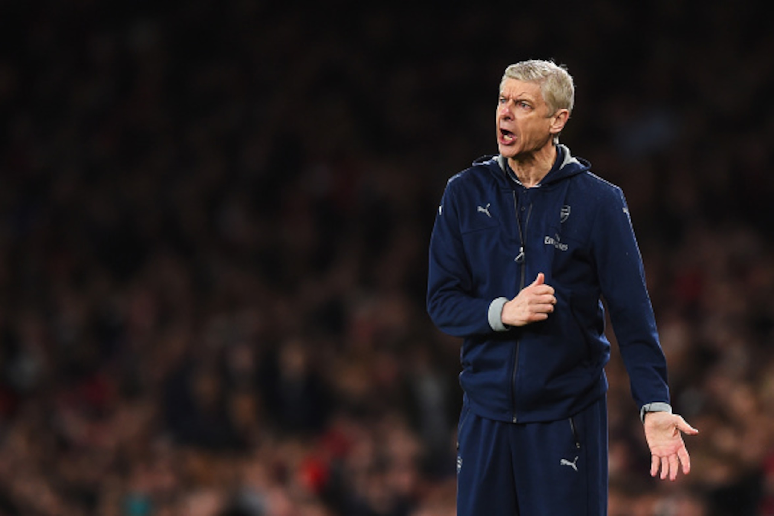 LONDON, ENGLAND - JANUARY 02:  Arsene Wenger Manager of Arsenal gestures during the Barclays Premier League match between Arsenal and Newcastle United at Emirates Stadium on January 2, 2016 in London, England.  (Photo by Shaun Botterill/Getty Images)