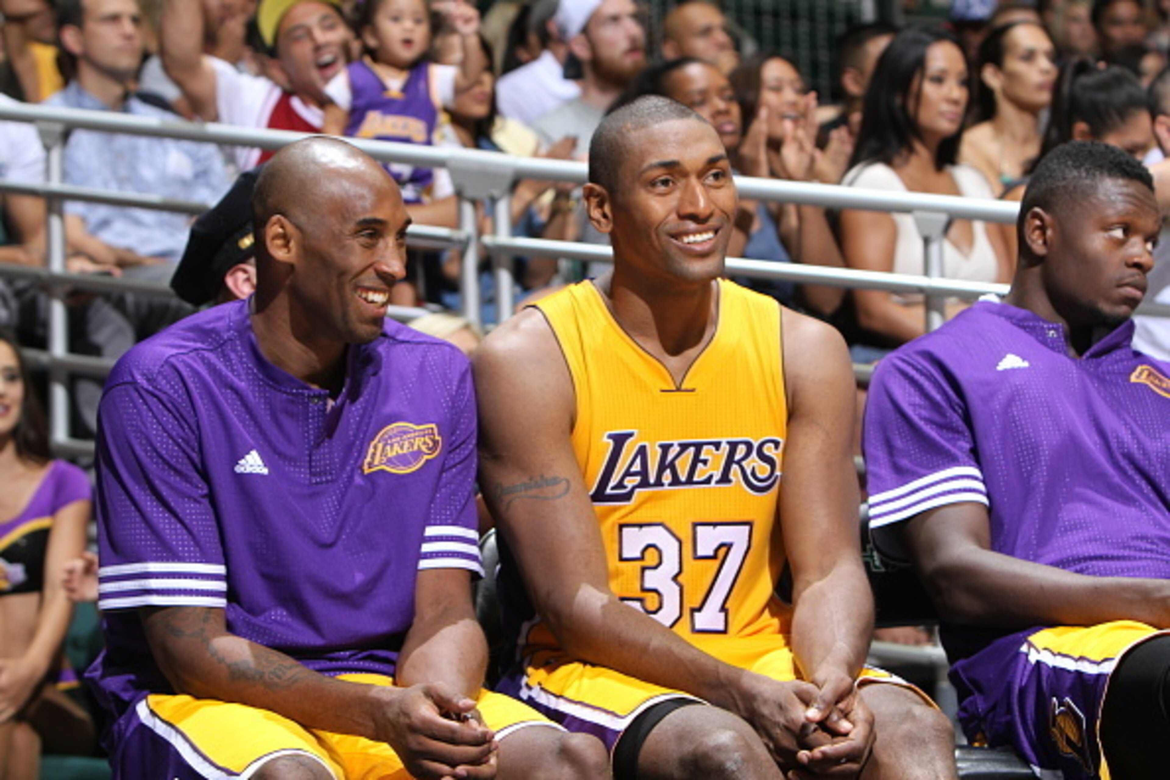 HONOLULU, HI - OCTOBER 6:  Kobe Bryant #24 of the Los Angeles Lakers and Metta World Peace #37 of the Los Angeles Lakers sit on the bench against the Utah Jazz during a preseason game on October 6, 2015 at the Stan Sheriff Center in Honolulu, Hawaii. NOTE