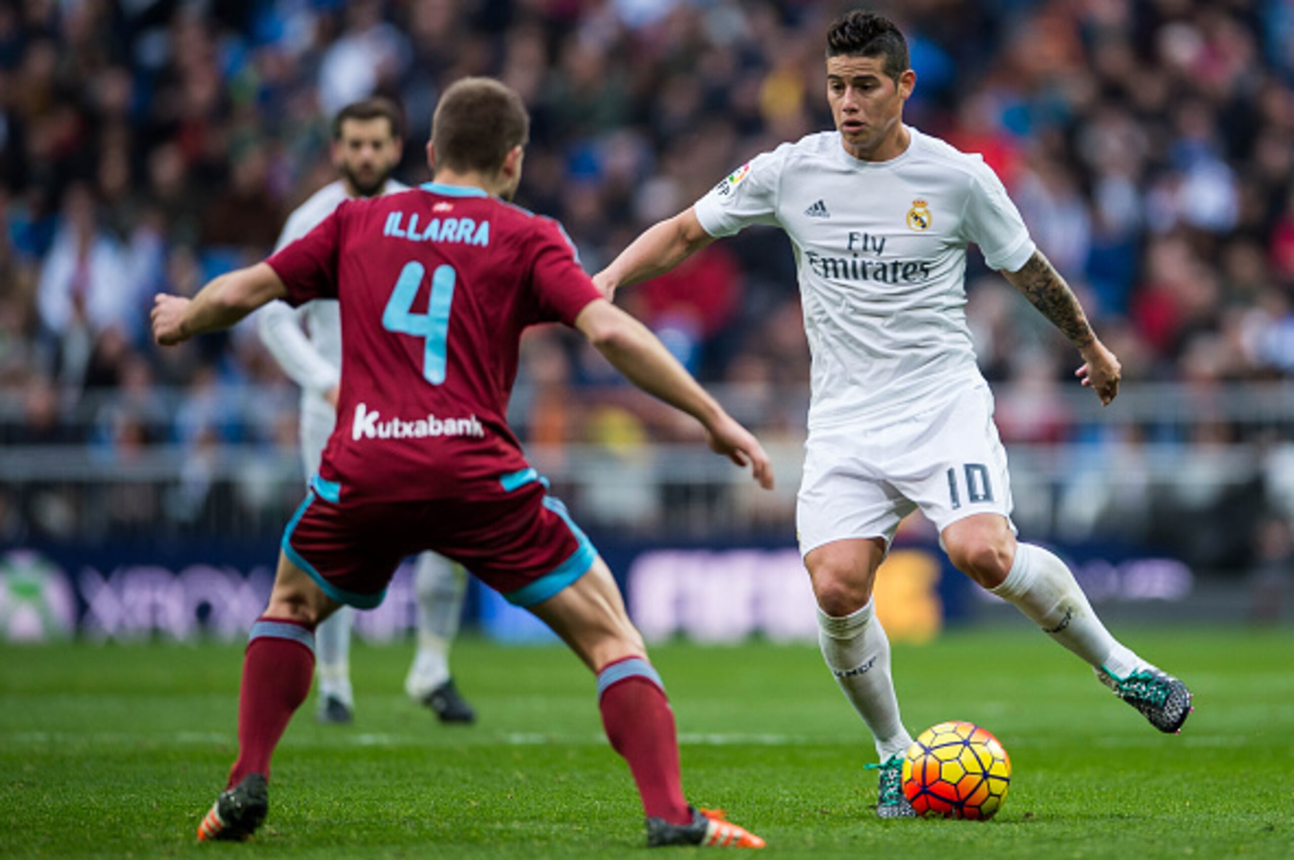 MADRID, SPAIN - DECEMBER 30:  James Rodriguez of Real Madrid CF (R) being followed by Asier Illarramendi of Real Sociedad (L) during the Real Madrid CF vs Real Sociedad as part of the Liga BBVA 2015-2016 at Estadio Santiago Bernabeu on December 30, 2015 i