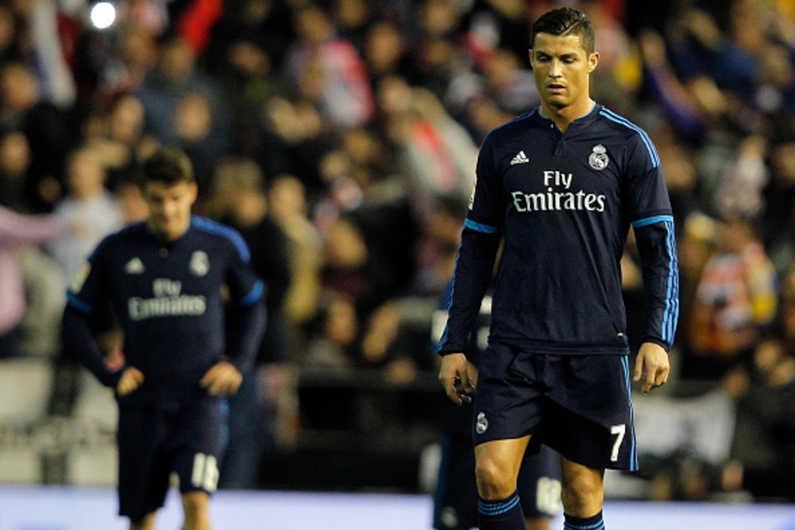 Real Madrid's Portuguese forward Cristiano Ronaldo walks on the pitch after a goal of Valencia during the Spanish league football match Valencia CF vs Real Madrid CF at the Mestalla stadium in Valencia on January 3, 2016.   AFP PHOTO/ JOSE JORDAN / AFP / 