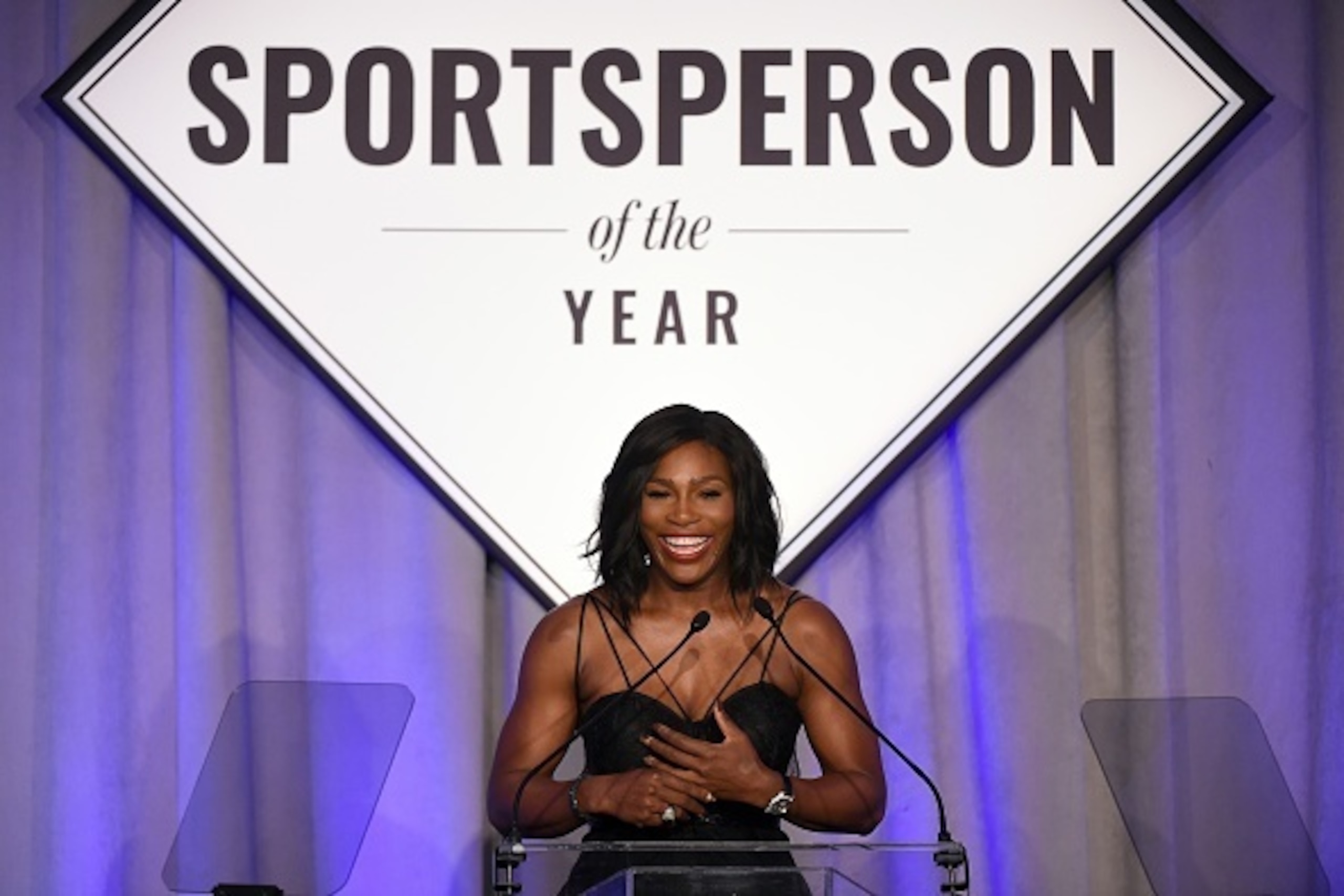 US Tennis player Serena Williams speaks after receiving the Sports Illustrated Sportsperson of the Year trophy during a ceremony in New York on December 15, 2015.  AFP PHOTO/JEWEL SAMAD / AFP / JEWEL SAMAD        (Photo credit should read JEWEL SAMAD/AFP/