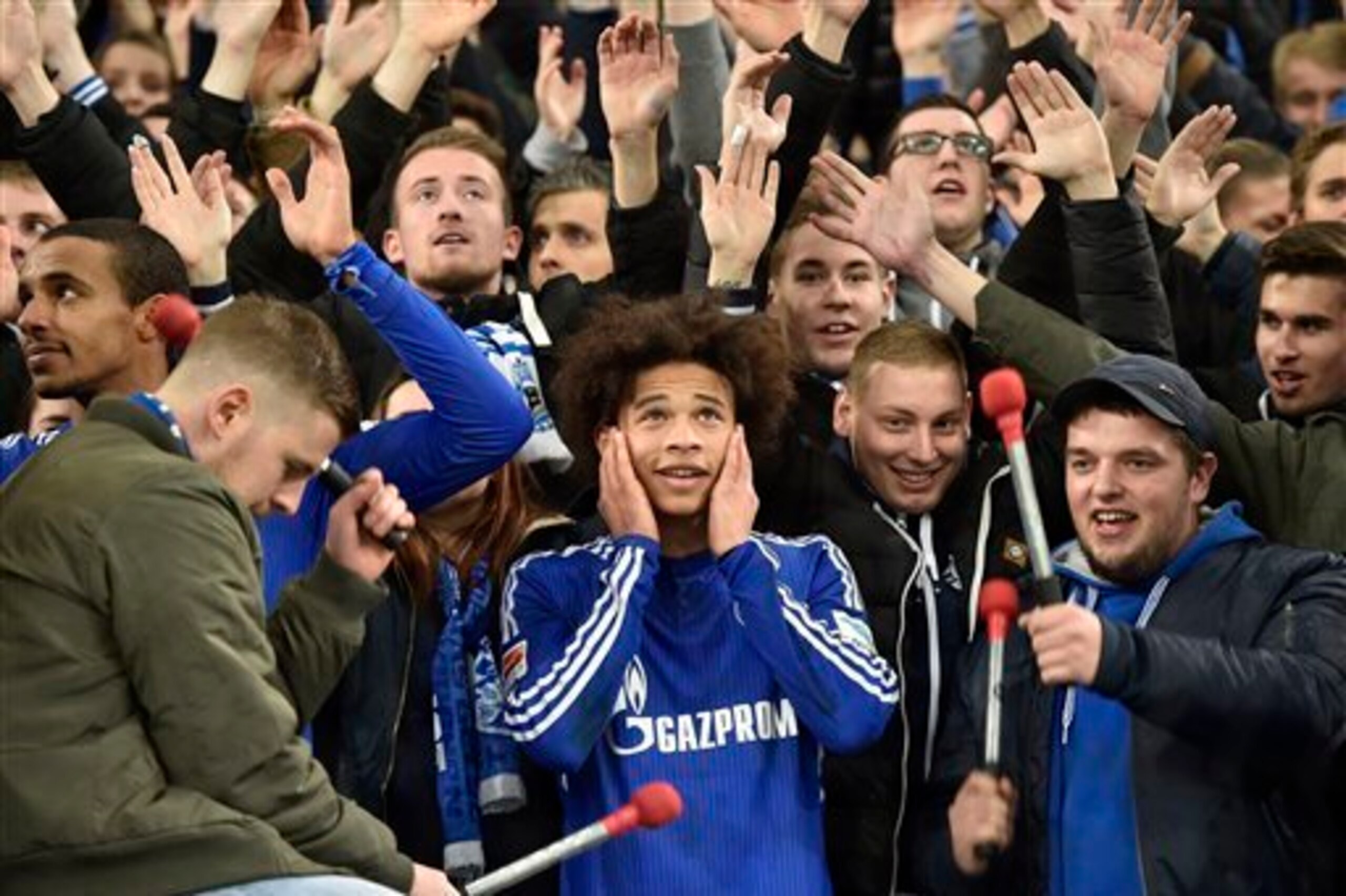 Sane celebrates with the Schalke fans.