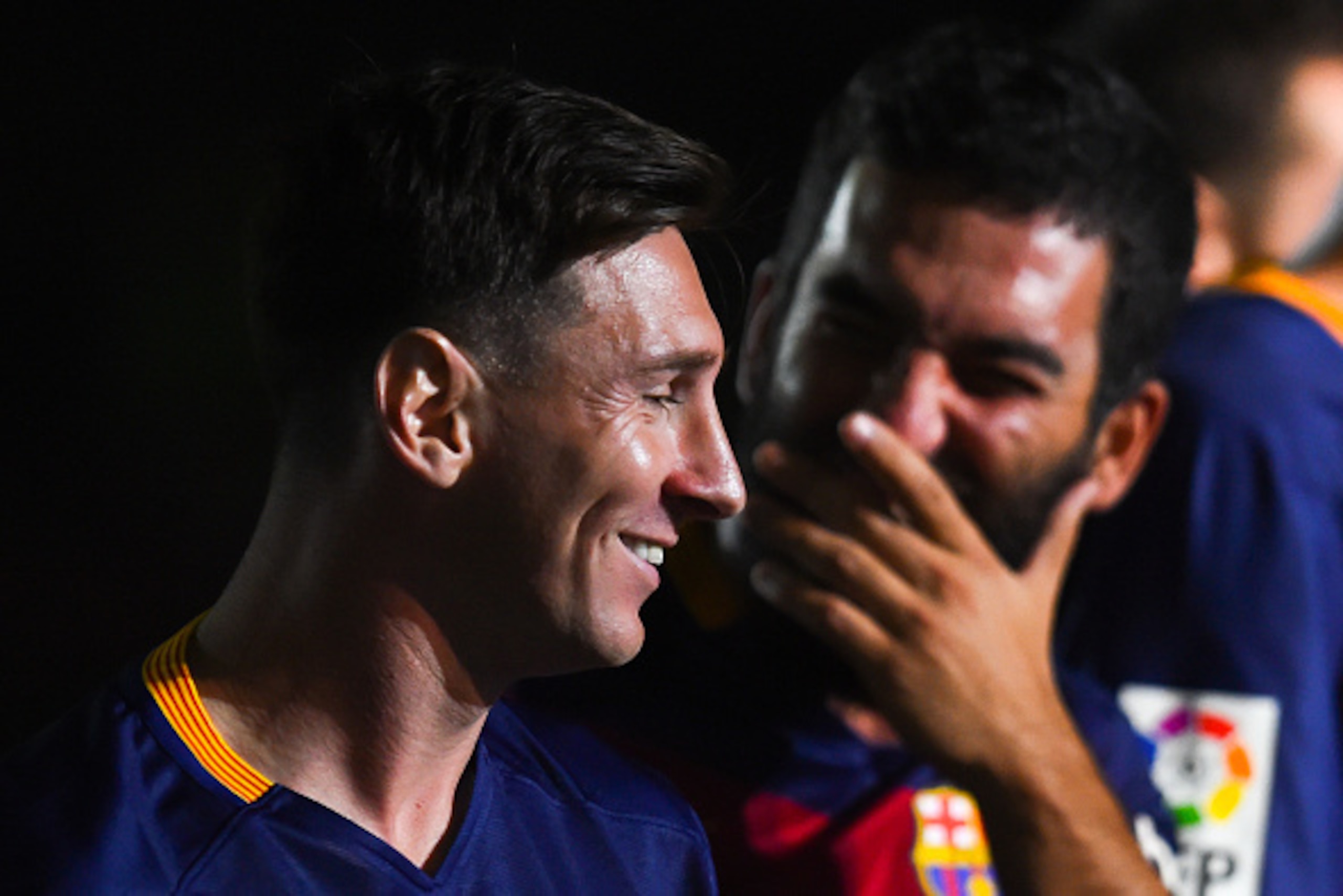 BARCELONA, SPAIN - AUGUST 05: Lionel Messi (L) and Arda Turan of FC Barcelona share a joke during the team official presentation ahead of the Joan Gamper trophy match at Camp Nou on August 5, 2015 in Barcelona, Spain. (Photo by David Ramos/Getty Images BARCELONA, SPAIN - AUGUST 05: Lionel Messi (L) and Arda Turan of FC Barcelona share a joke during the team official presentation ahead of the Joan Gamper trophy match at Camp Nou on August 5, 2015 in Barcelona, Spain. (Photo by David Ramos/Getty Images