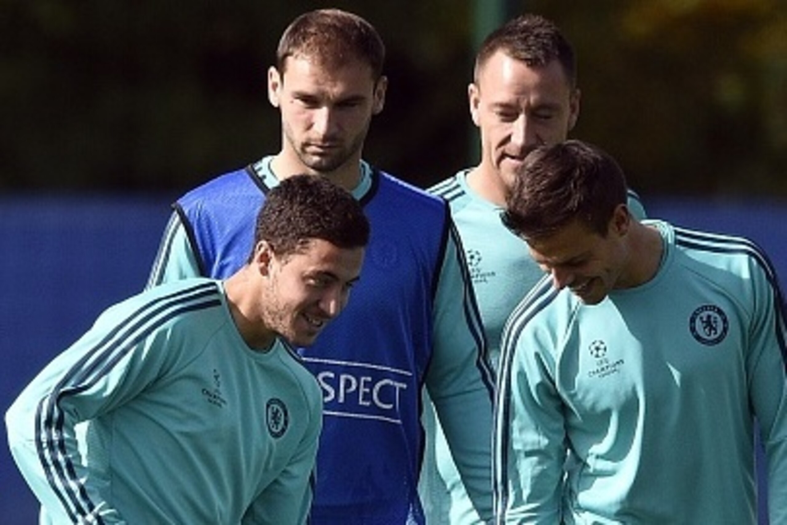 (From L) Chelsea's Belgian midfielder Eden Hazard, Serbian defender Branislav Ivanovic, English defender John Terry and  Spanish defender Cesar Azpilicueta take part   in a training session at Chelsea's training ground in Stoke D'Abernon, south of London,