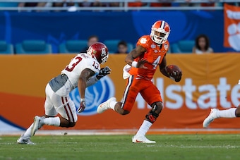 MIAMI GARDENS, FL - DECEMBER 31: Ahmad Thomas #13 of the Oklahoma Sooners pursues Deshaun Watson #4 of the Clemson Tigers during the 2015 Capital One Orange Bowl at Sun Life Stadium on December 29, 2015 in Miami Gardens, Florida. Clemson defeated Oklahoma MIAMI GARDENS, FL - DECEMBER 31: Ahmad Thomas #13 of the Oklahoma Sooners pursues Deshaun Watson #4 of the Clemson Tigers during the 2015 Capital One Orange Bowl at Sun Life Stadium on December 29, 2015 in Miami Gardens, Florida. Clemson defeated Oklahoma