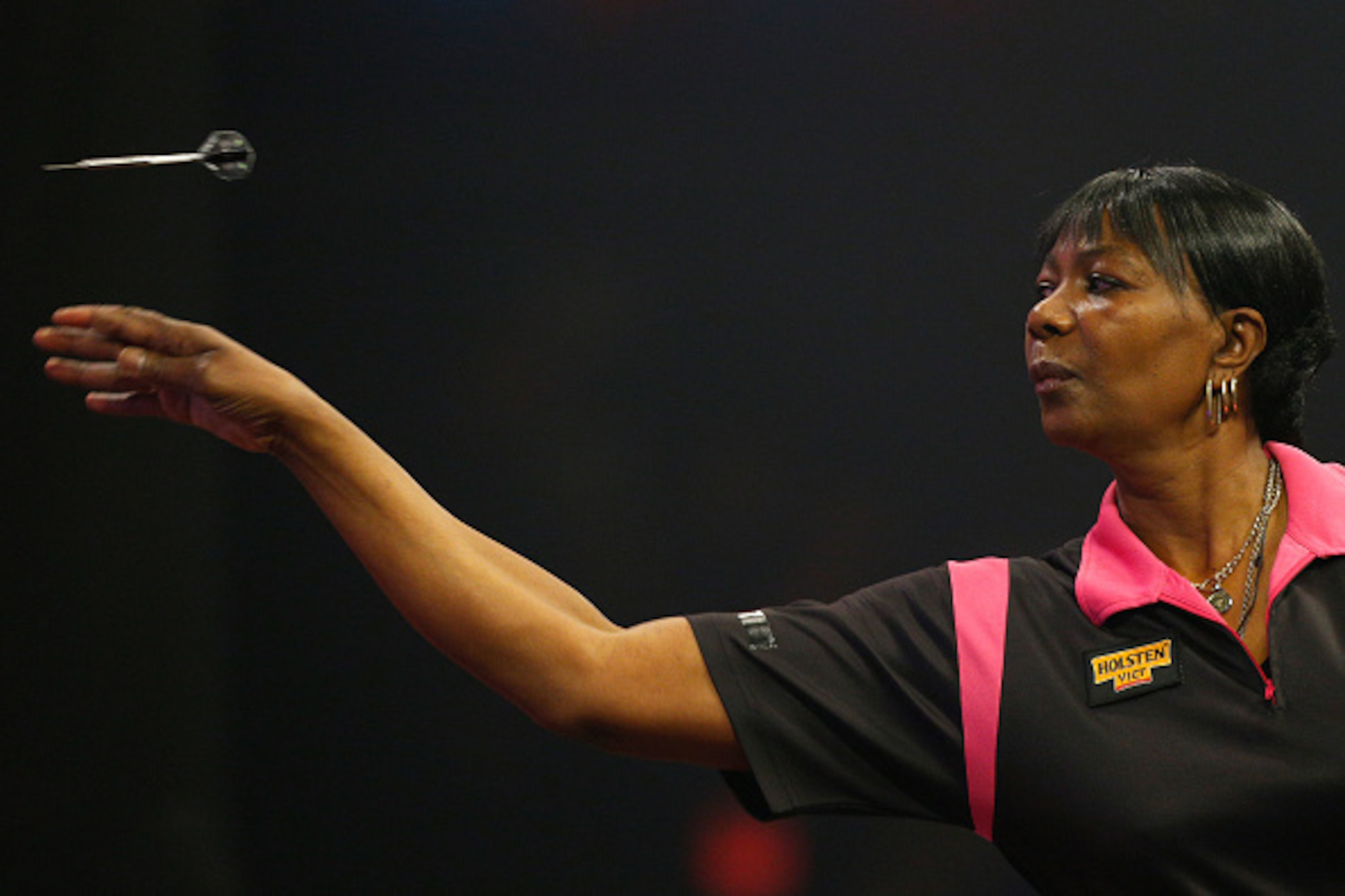FRIMLEY, ENGLAND - JANUARY 03: Deta Hedman of England throws during her first round match against Lisa Ashton of England on day one of the BDO Lakeside World Professional Darts Championships at the Lakeside Complex on January 3, 2015 in Frimley, England. 