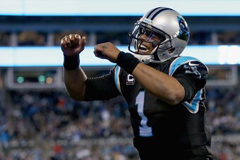 CHARLOTTE, NC - JANUARY 03:   Cam Newton #1 of the Carolina Panthers celebrates a 4th quarter touchdown against the Tampa Bay Buccaneers during their game at Bank of America Stadium on January 3, 2016 in Charlotte, North Carolina.  (Photo by Streeter Leck