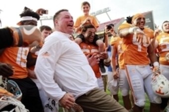 Jan 1, 2016; Tampa, FL, USA; Tennessee Volunteers head coach Butch Jones and  his team celebrate as they beat the Northwestern Wildcats in the 2016 Outback Bowl at Raymond James Stadium. Tennessee Volunteers defeated the Northwestern Wildcats 45-6. Tennes