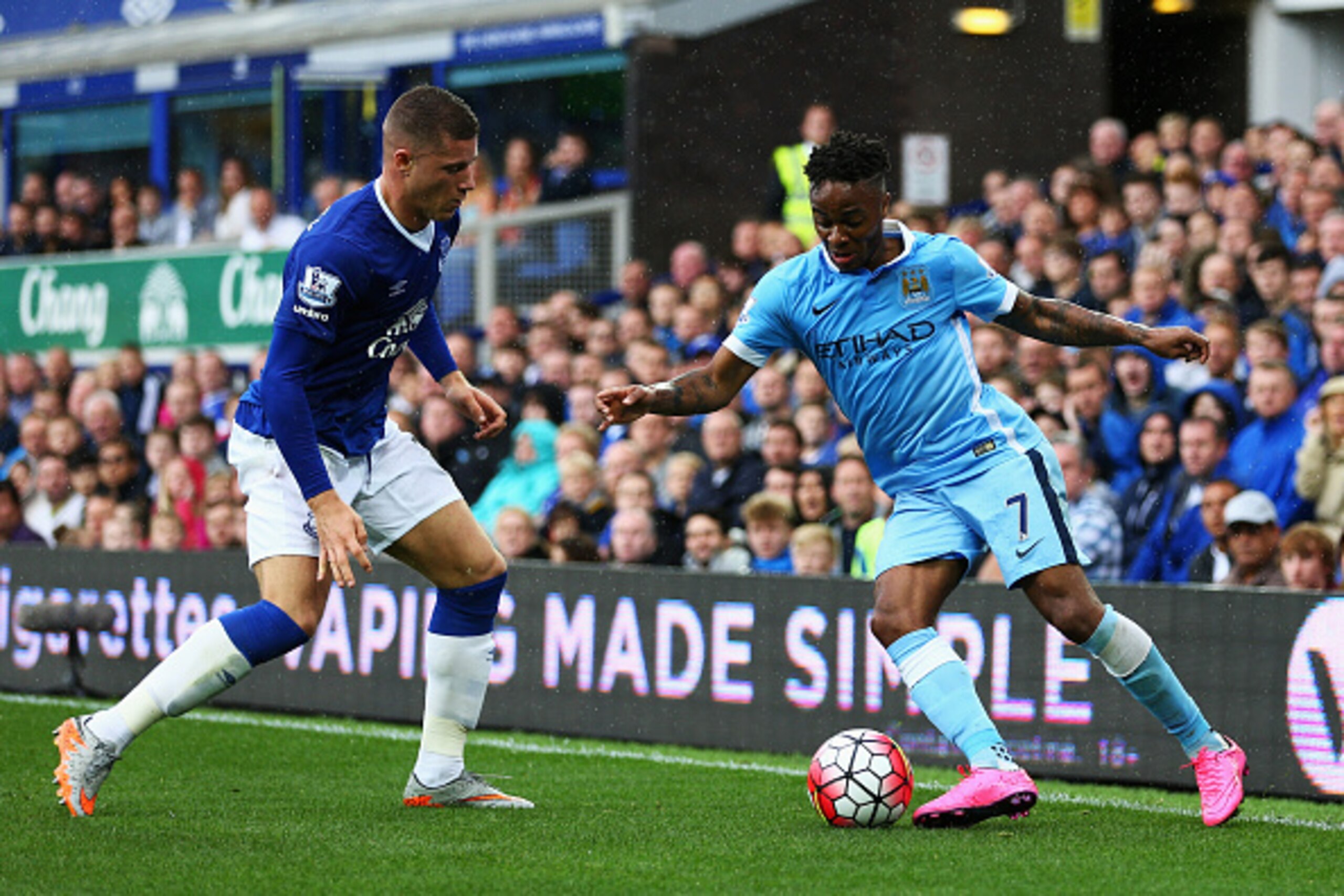 LIVERPOOL, ENGLAND - AUGUST 23: Raheem Sterling of Manchester City takes on Ross Barkley of Everton during the Barclays Premier League match between Everton and Manchester City at Goodison Park on August 23, 2015 in Liverpool, England.  (Photo by Clive Br