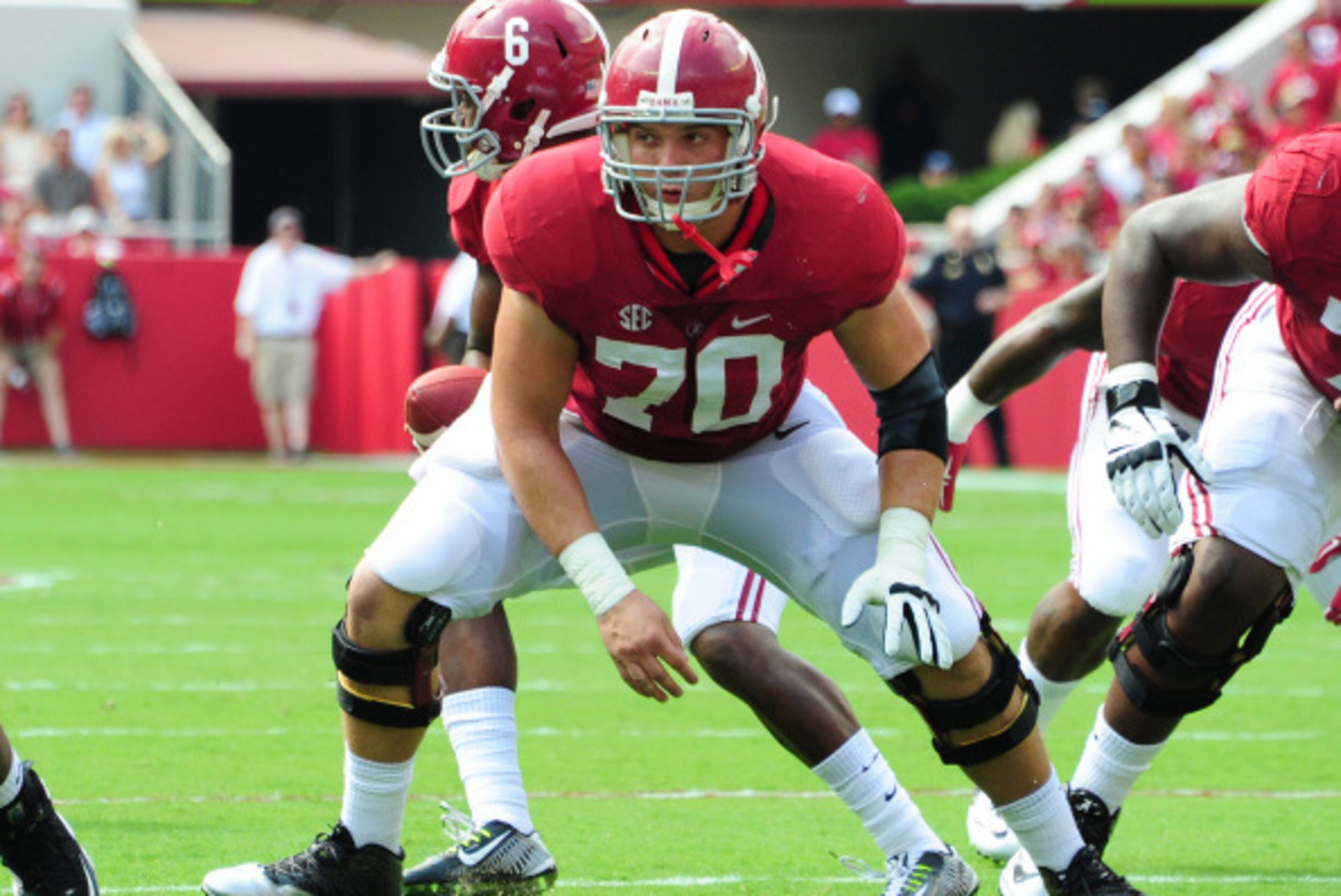 TUSCALOOSA, AL - SEPTEMBER 6: Ryan Kelly #70 of the Alabama Crimson Tide blocks against the Florida Atlantc Owls on September 6, 2014 at Bryant-Denny Stadium in Tuscaloosa, Alabama. (Photo by Scott Cunningham/Getty Images)