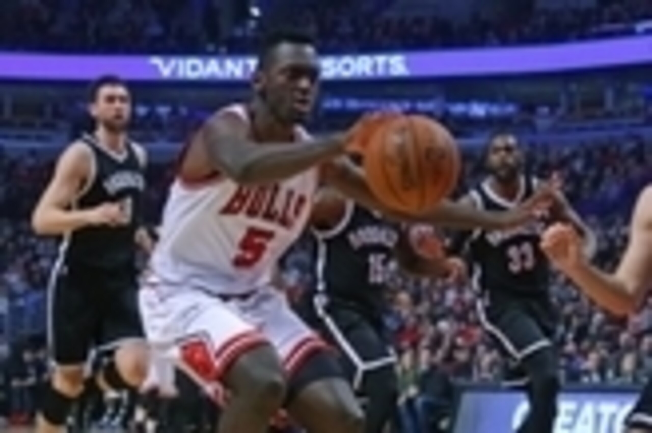 Dec 21, 2015; Chicago, IL, USA; Chicago Bulls forward Bobby Portis (5) chases the ball with Brooklyn Nets guard Bojan Bogdanovic (44) during the second quarter at the United Center. Mandatory Credit: Dennis Wierzbicki-USA TODAY Sports