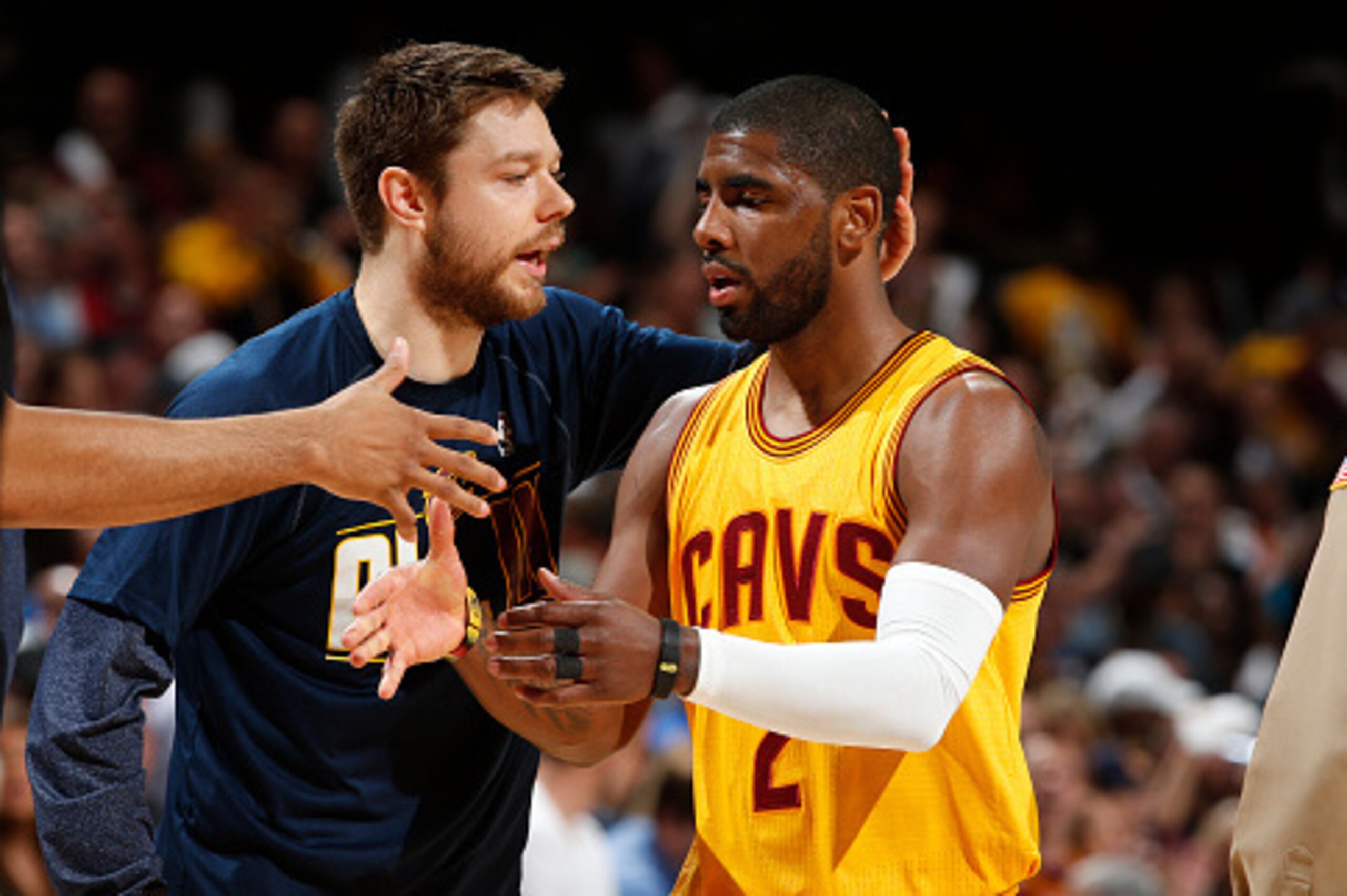 CLEVELAND, OH - MAY 12:  Kyrie Irving #2 celebrates with Matthew Dellavedova #8 of the Cleveland Cavaliers in Game Five of the Eastern Conference Semifinals against the Chicago Bulls during the 2015 NBA Playoffs on May 12, 2015 at The Quicken Loans Arena 