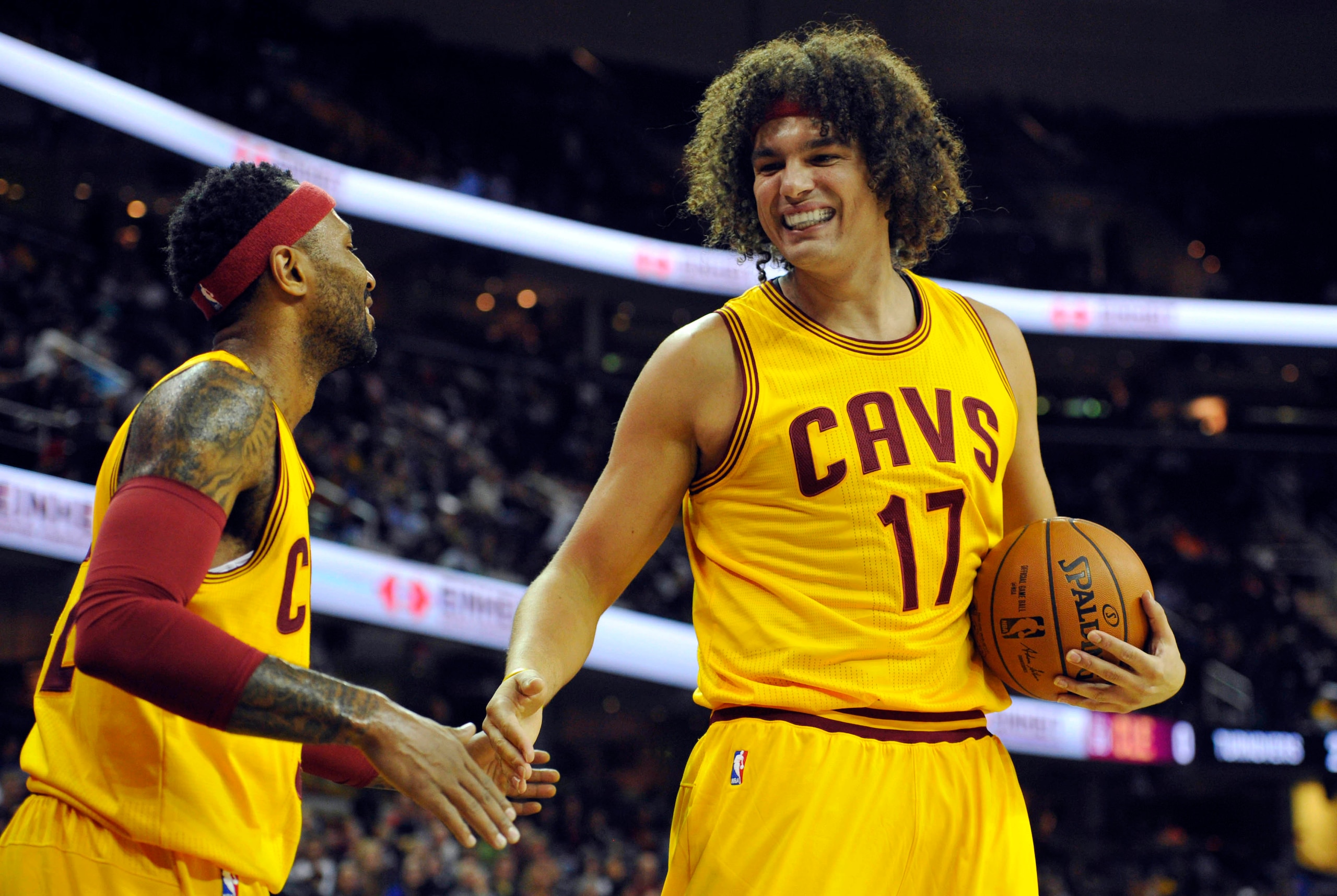 Oct 13, 2015; Cleveland, OH, USA; Cleveland Cavaliers forward Anderson Varejao (17) and guard Mo Williams (52) react in the first quarter against the Milwaukee Bucks at Quicken Loans Arena. Mandatory Credit: David Richard-USA TODAY Sports