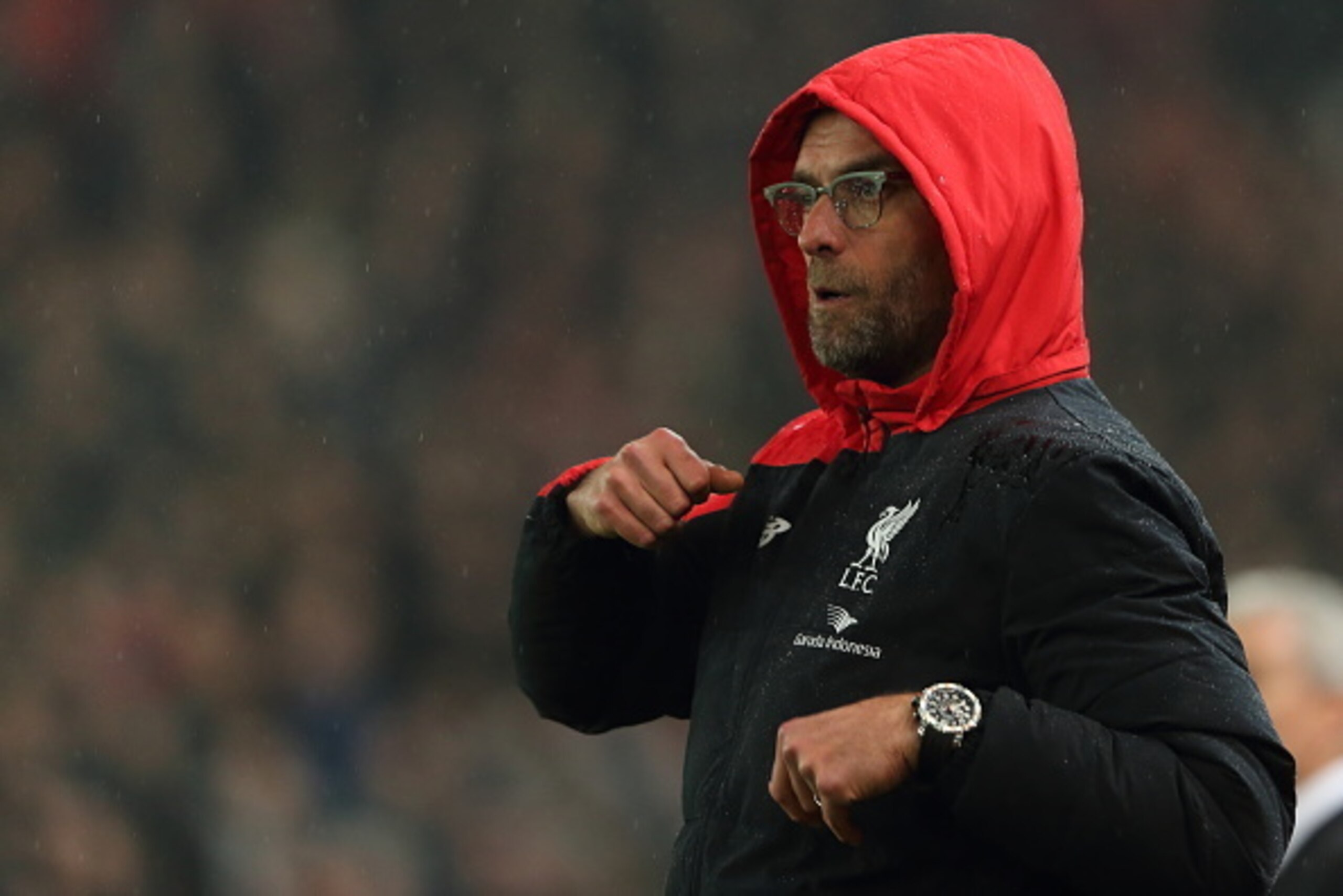 STOKE ON TRENT, ENGLAND - JANUARY 05: Jurgen Klopp the head coach / manager of Liverpool reacts as his team take the lead during the Capital One Cup Semi Final, First Leg, between Stoke City and Liverpool at Britannia Stadium on January 5, 2016 in Stoke o