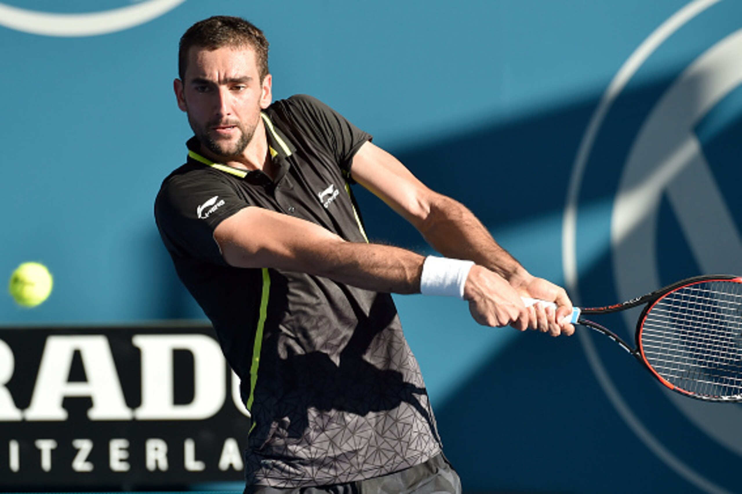 Marin Cilic of Croatia hits a return against Chung Hyeon of South Korea during their men's singles match on the fourth day of the Brisbane International tennis tournament on January 6, 2016. AFP PHOTO / Saeed KHAN
-- IMAGE RESTRICTED TO EDITORIAL USE - ST Marin Cilic of Croatia hits a return against Chung Hyeon of South Korea during their men's singles match on the fourth day of the Brisbane International tennis tournament on January 6, 2016. AFP PHOTO / Saeed KHAN
-- IMAGE RESTRICTED TO EDITORIAL USE - ST