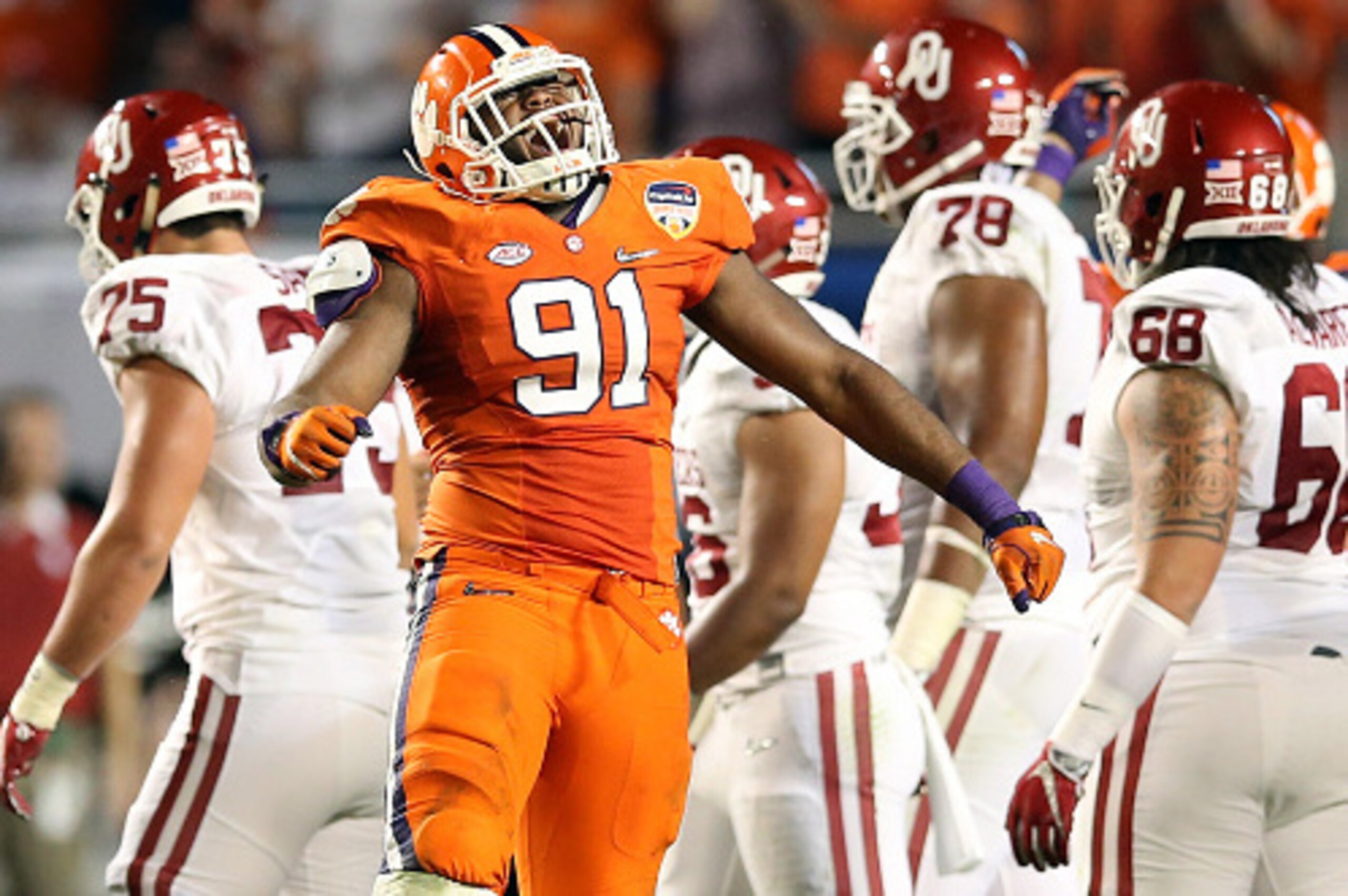 MIAMI GARDENS, FL - DECEMBER 31:  Austin Bryant #91 of the Clemson Tigers celebrates after stopping the Oklahoma Sooners on fourth down in the third quarter during the 2015 Capital One Orange Bowl at Sun Life Stadium on December 31, 2015 in Miami Gardens,
