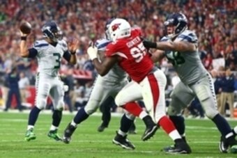Jan 3, 2016; Glendale, AZ, USA; Seattle Seahawks quarterback Russell Wilson (3) throws a pass in the first half against the Arizona Cardinals at University of Phoenix Stadium. Mandatory Credit: Mark J. Rebilas-USA TODAY Sports