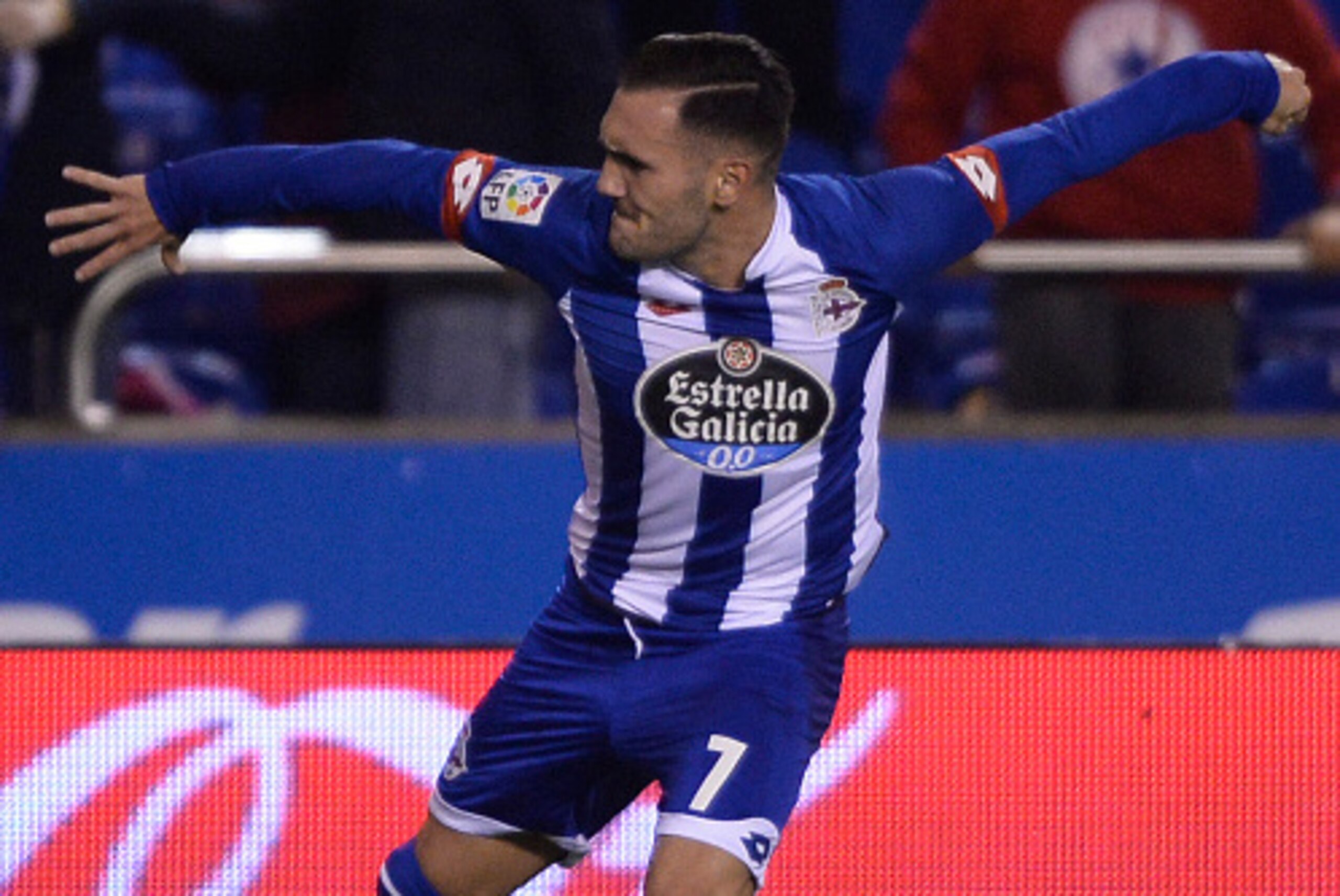 Deportivo La Coruna's midfielder Lucas Perez celebrates a goal during the Spanish league football match RC Deportivo de la Coruna vs Sevilla FC at the Municipal de Riazor stadium in La Coruna on December 5, 2015. AFP PHOTO / MIGUEL RIOPA / AFP / MIGUEL Deportivo La Coruna's midfielder Lucas Perez celebrates a goal during the Spanish league football match RC Deportivo de la Coruna vs Sevilla FC at the Municipal de Riazor stadium in La Coruna on December 5, 2015. AFP PHOTO / MIGUEL RIOPA / AFP / MIGUEL