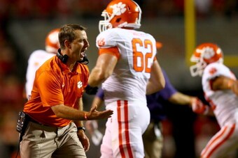 RALEIGH, NC - SEPTEMBER 19:  Head coach Dabo Swinney yells to his team from the sidelines against the North Carolina State Wolfpack during their game at Carter-Finley Stadium on September 19, 2013 in Raleigh, North Carolina.  (Photo by Streeter Lecka/Gett