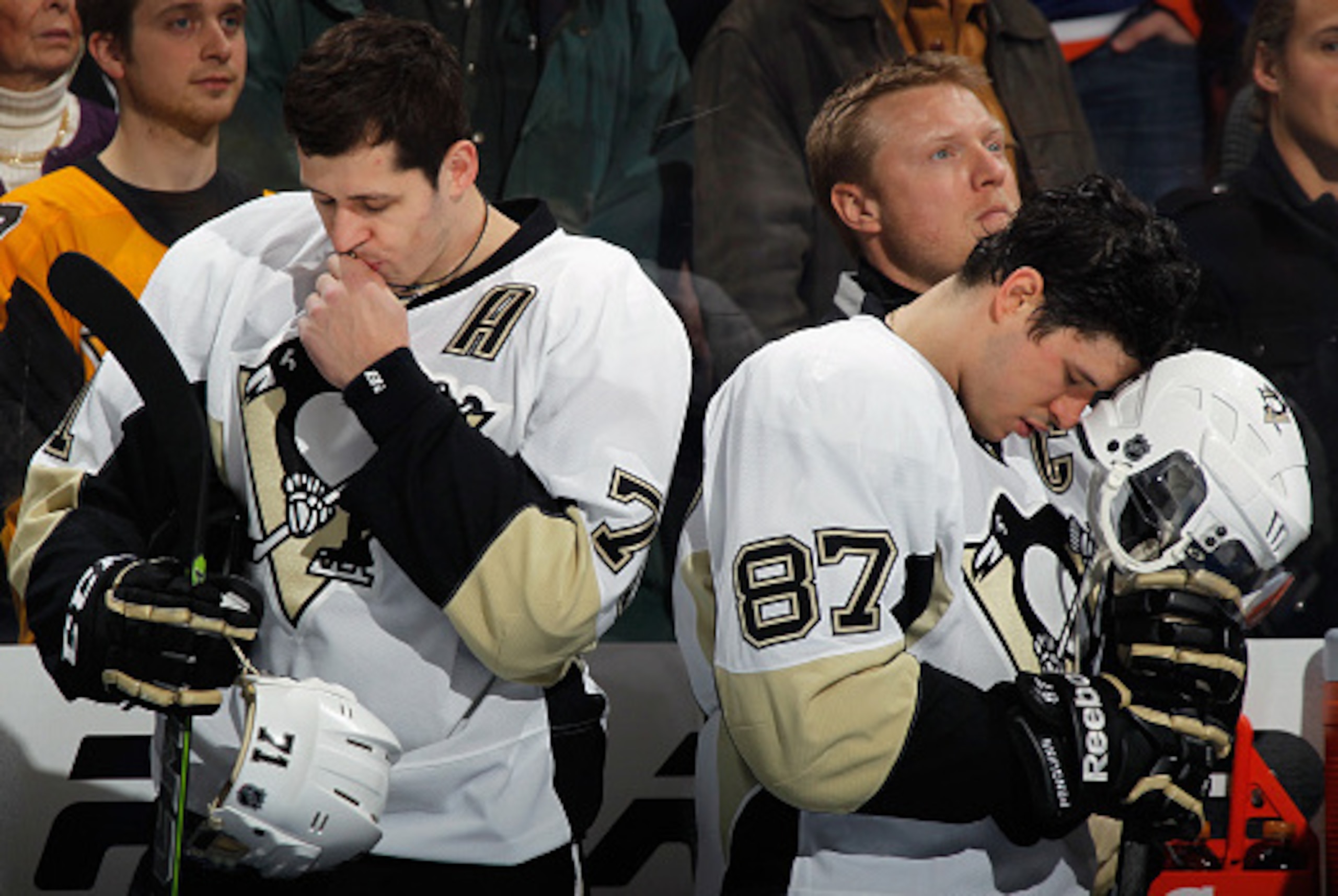 UNIONDALE, NY - JANUARY 16: Pittsburgh Penguins stars Evgeni Malkin #71 and Sidney Crosby #87 pause prior to their game against against the New York Islanders at the Nassau Veterans Memorial Coliseum on January 16, 2015 in Uniondale, New York.  (Photo by 