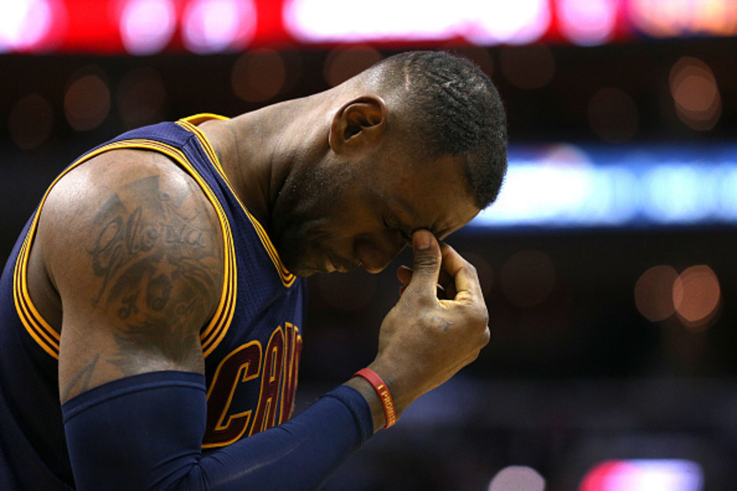 WASHINGTON, DC - JANUARY 06: LeBron James #23 of the Cleveland Cavaliers holds his forehead after being hit in the face on a play against the Washington Wizards during the first half at Verizon Center on January 6, 2016 in Washington, DC. NOTE TO USER: Us
