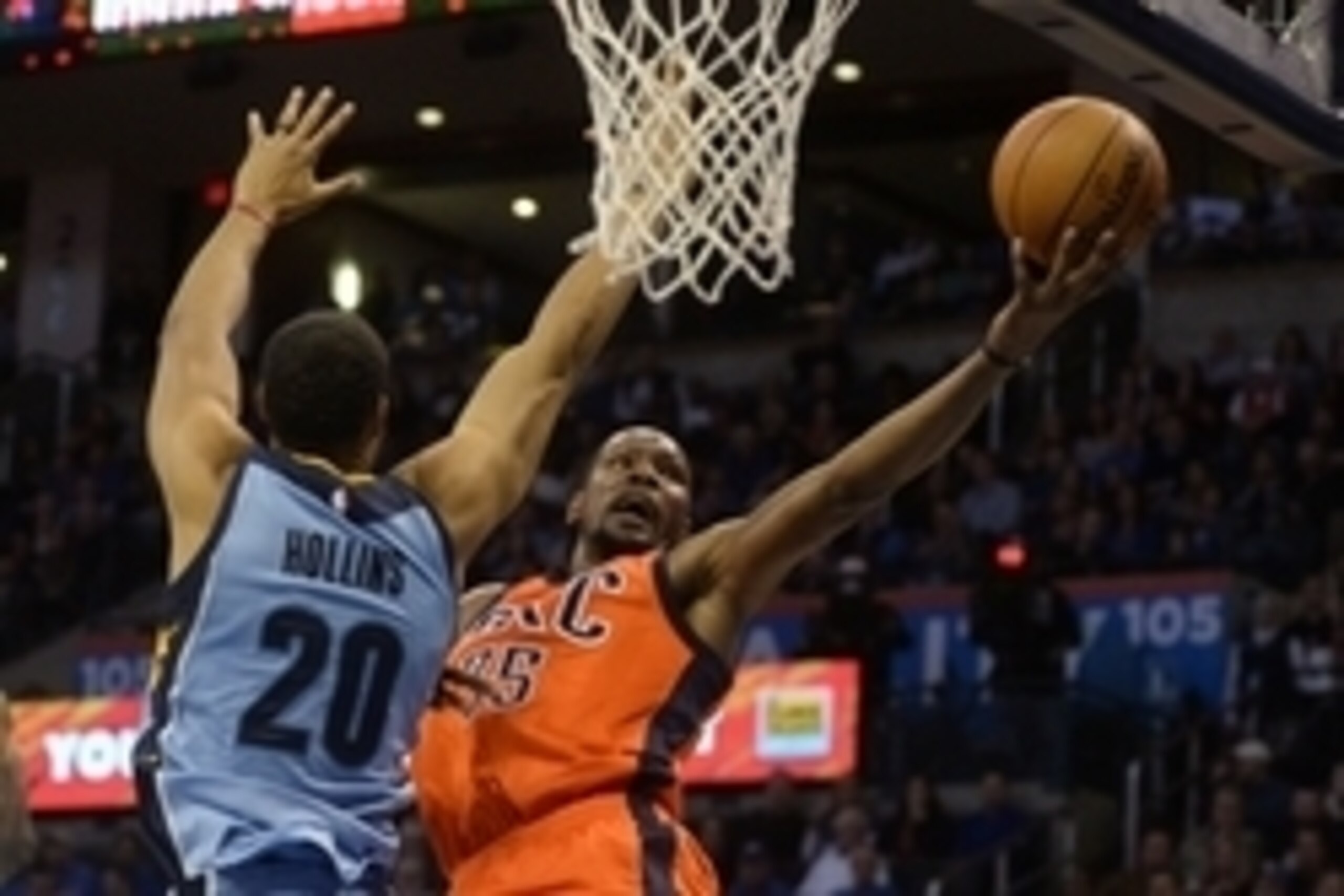 Jan 6, 2016; Oklahoma City, OK, USA;  Oklahoma City Thunder forward Kevin Durant (35) shoots the ball around Memphis Grizzlies center Ryan Hollins (20) during the second quarter at Chesapeake Energy Arena. Mandatory Credit: Mark D. Smith-USA TODAY Sports
