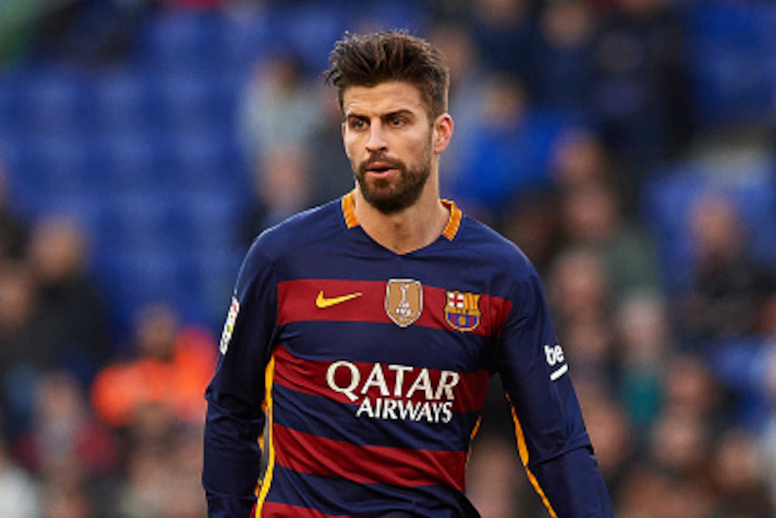 BARCELONA, SPAIN - JANUARY 02:  Gerard Pique of Barcelona runs with the ball during the La Liga match between Real CD Espanyol and FC Barcelona at Cornella-El Prat Stadium on January 2, 2016 in Barcelona, Spain.  (Photo by Manuel Queimadelos Alonso/Getty 