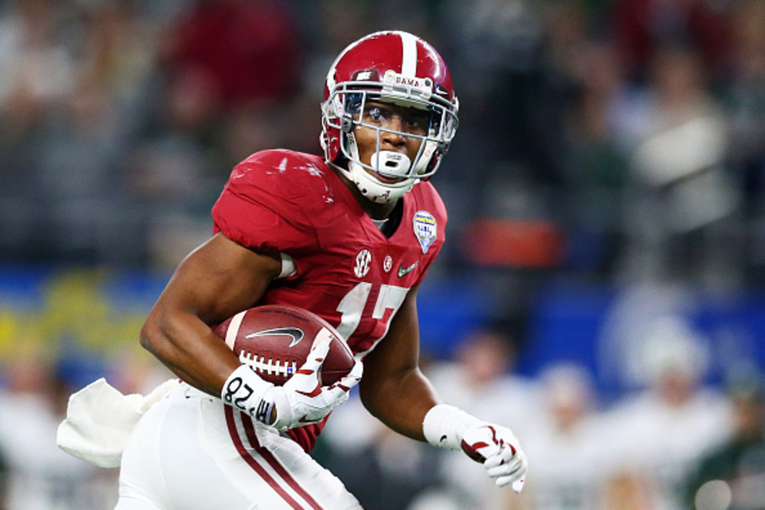 ARLINGTON, TX - DECEMBER 31:  Running back Kenyan Drake #17 of the Alabama Crimson Tide runs for 58-yards in the fourth quarter against the Michigan State Spartans during the Goodyear Cotton Bowl at AT&T Stadium on December 31, 2015 in Arlington, Texas.  