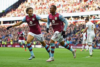 BIRMINGHAM, ENGLAND - OCTOBER 24:  Jordan Ayew (R) of Aston Villa celebrates scoring his team's first goal with Rudy Gestede (L) during the Barclays Premier League match between Aston Villa and Swansea City at Villa Park on October 24, 2015 in Birmingham,