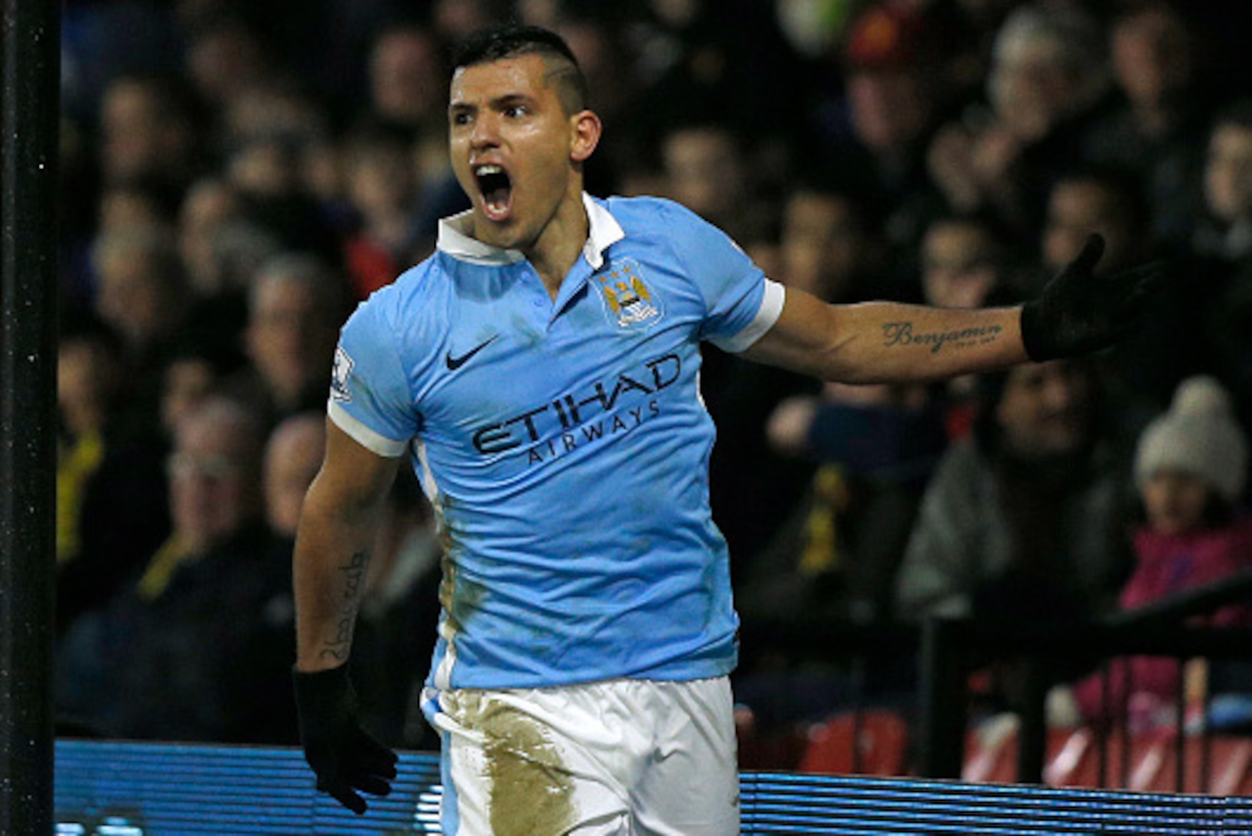 Manchester City's Argentinian striker Sergio Aguero celebrates after scoring their second goal during the English Premier League football match between Watford and Manchester City at Vicarage Road Stadium in Watford, north of London on January 2, 2016. AF